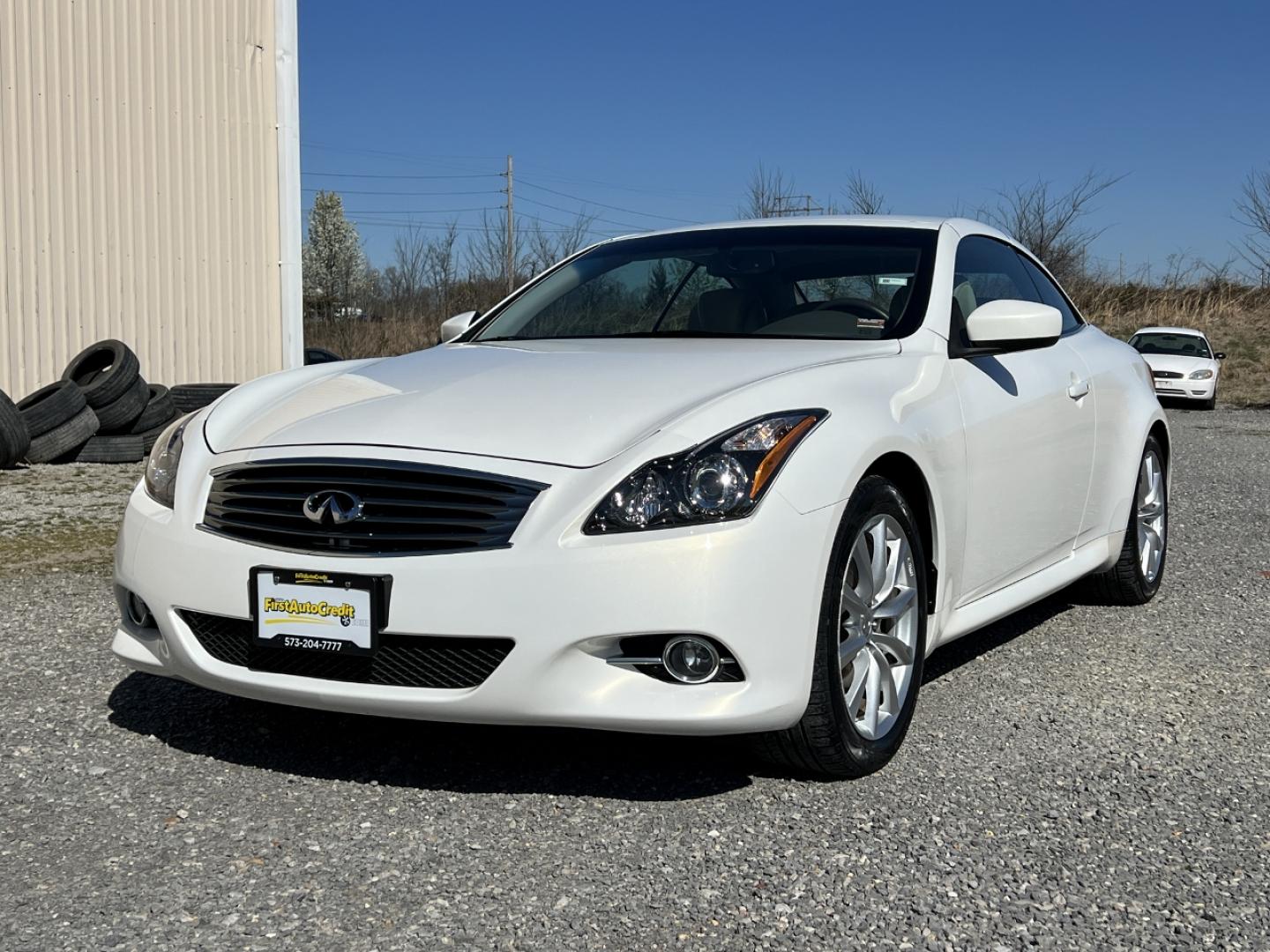 2014 WHITE /Tan Leather INFINITI Q60 BASE (JN1CV6FE3EM) with an 3.7L V6 engine, Automatic transmission, located at 506 S. Kingshighway, Cape Girardeau, MO, 63703, 37.294994, -89.556206 - 2014 Infiniti Q60 Convertible Only 84xxx miles Rear Wheel Drive 3.7L V6 Automatic Leather Navigation Power/Heated/Cooled Seats Backup Camera Bluetooth Cruise Power Windows/Locks/Mirrors We have financing available and we accept trades! Fill out a credit application on our website or come - Photo#6