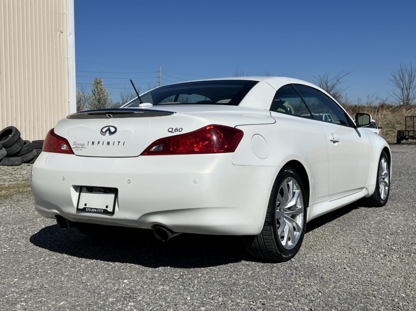 2014 WHITE /Tan Leather INFINITI Q60 BASE (JN1CV6FE3EM) with an 3.7L V6 engine, Automatic transmission, located at 506 S. Kingshighway, Cape Girardeau, MO, 63703, 37.294994, -89.556206 - 2014 Infiniti Q60 Convertible Only 84xxx miles Rear Wheel Drive 3.7L V6 Automatic Leather Navigation Power/Heated/Cooled Seats Backup Camera Bluetooth Cruise Power Windows/Locks/Mirrors We have financing available and we accept trades! Fill out a credit application on our website or come - Photo#9
