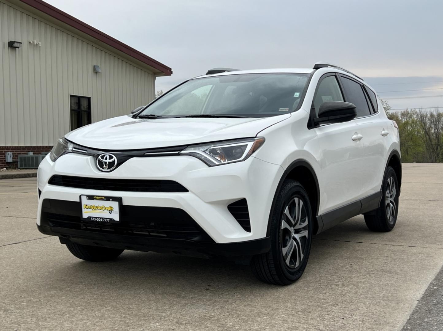 2016 WHITE /Black Cloth Toyota RAV4 LE AWD (JTMBFREV6GJ) with an 2.5L 4 Cyl. engine, Automatic transmission, located at 2990 Old Orchard Rd., Jackson, MO, 63755, 37.354214, -89.612106 - 2016 Toyota RAV4 LE 153xxx miles All Wheel Drive 2.5L 4 Cyl. Automatic Backup Camera Bluetooth Cruise Power Windows/Locks/Mirrors We have financing available and we accept trades! Fill out a credit application on our website or come by today! If you have any questions, give us a call at (5 - Photo#3