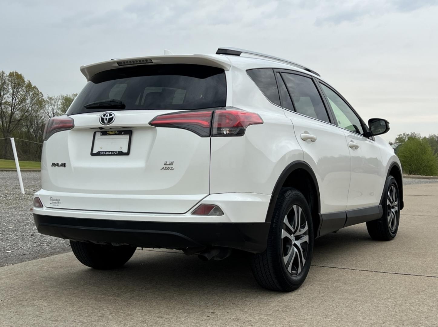 2016 WHITE /Black Cloth Toyota RAV4 LE AWD (JTMBFREV6GJ) with an 2.5L 4 Cyl. engine, Automatic transmission, located at 2990 Old Orchard Rd., Jackson, MO, 63755, 37.354214, -89.612106 - 2016 Toyota RAV4 LE 153xxx miles All Wheel Drive 2.5L 4 Cyl. Automatic Backup Camera Bluetooth Cruise Power Windows/Locks/Mirrors We have financing available and we accept trades! Fill out a credit application on our website or come by today! If you have any questions, give us a call at (5 - Photo#6