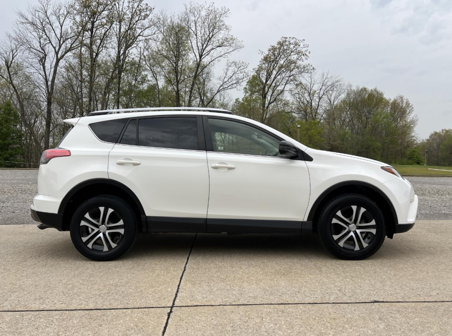 2016 WHITE /Black Cloth Toyota RAV4 LE AWD (JTMBFREV6GJ) with an 2.5L 4 Cyl. engine, Automatic transmission, located at 2990 Old Orchard Rd., Jackson, MO, 63755, 37.354214, -89.612106 - 2016 Toyota RAV4 LE 153xxx miles All Wheel Drive 2.5L 4 Cyl. Automatic Backup Camera Bluetooth Cruise Power Windows/Locks/Mirrors We have financing available and we accept trades! Fill out a credit application on our website or come by today! If you have any questions, give us a call at (5 - Photo#5