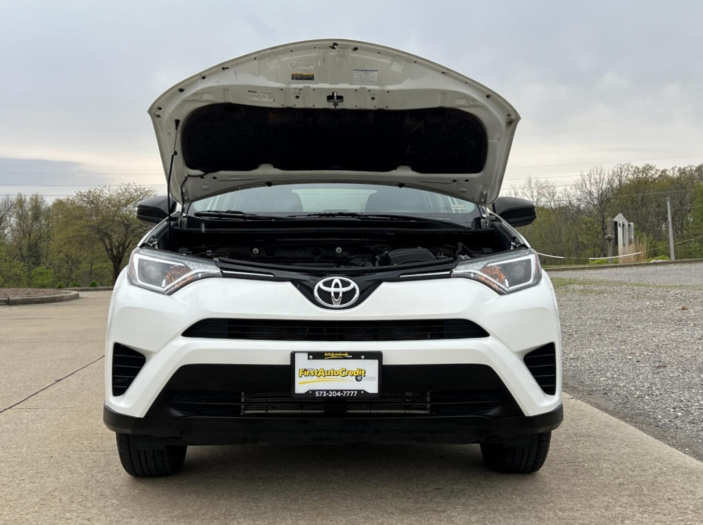 2016 WHITE /Black Cloth Toyota RAV4 LE AWD (JTMBFREV6GJ) with an 2.5L 4 Cyl. engine, Automatic transmission, located at 2990 Old Orchard Rd., Jackson, MO, 63755, 37.354214, -89.612106 - 2016 Toyota RAV4 LE 153xxx miles All Wheel Drive 2.5L 4 Cyl. Automatic Backup Camera Bluetooth Cruise Power Windows/Locks/Mirrors We have financing available and we accept trades! Fill out a credit application on our website or come by today! If you have any questions, give us a call at (5 - Photo#28