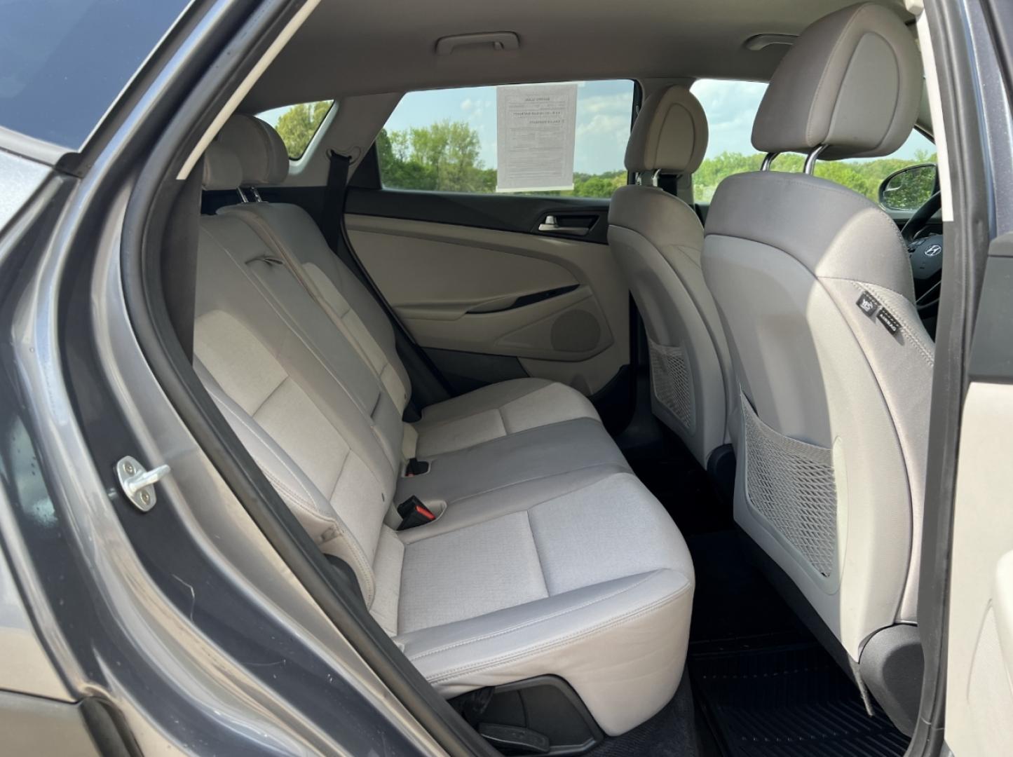 2018 GRAY /Gray Cloth Hyundai Tucson SE AWD (KM8J3CA46JU) with an 2.0L 4 Cyl. engine, Automatic transmission, located at 2990 Old Orchard Rd., Jackson, MO, 63755, 37.354214, -89.612106 - 2018 Hyundai Tucson SEL 124xxx miles All Wheel Drive 2.0L 4 Cyl. Automatic Backup Camera Power Driver Seat Heated Seats Bluetooth Cruise Power Windows/Locks/Mirrors We have financing available and we accept trades! Fill out a credit application on our website or come by today! If you hav - Photo#17