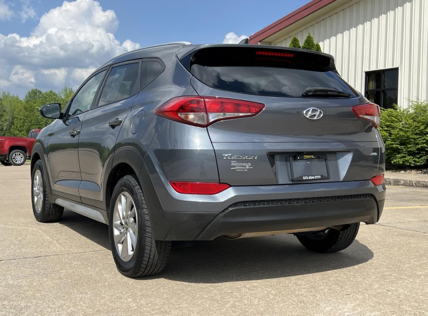 2018 GRAY /Gray Cloth Hyundai Tucson SE AWD (KM8J3CA46JU) with an 2.0L 4 Cyl. engine, Automatic transmission, located at 2990 Old Orchard Rd., Jackson, MO, 63755, 37.354214, -89.612106 - 2018 Hyundai Tucson SEL 124xxx miles All Wheel Drive 2.0L 4 Cyl. Automatic Backup Camera Power Driver Seat Heated Seats Bluetooth Cruise Power Windows/Locks/Mirrors We have financing available and we accept trades! Fill out a credit application on our website or come by today! If you hav - Photo#9