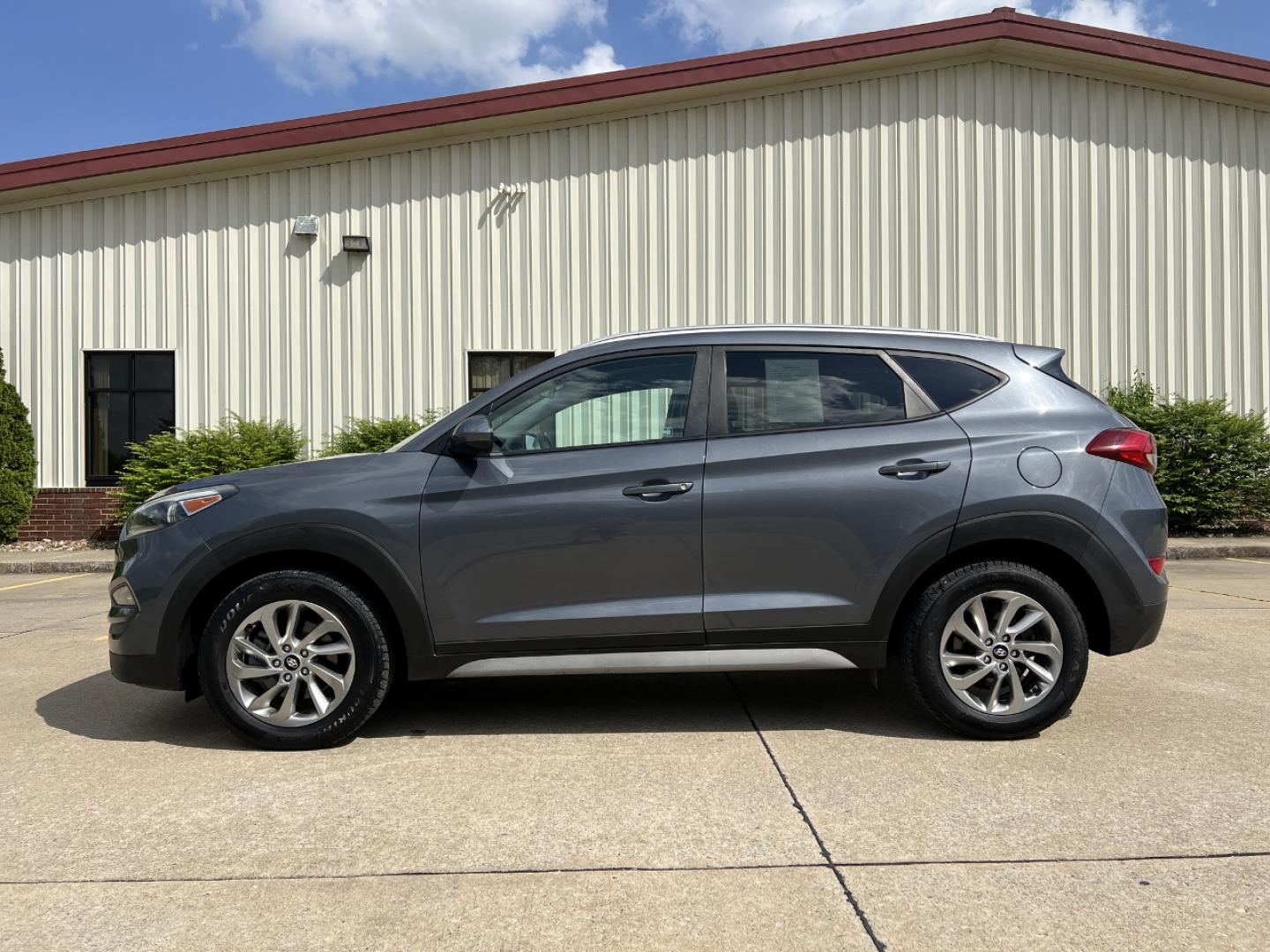 2018 GRAY /Gray Cloth Hyundai Tucson SE AWD (KM8J3CA46JU) with an 2.0L 4 Cyl. engine, Automatic transmission, located at 2990 Old Orchard Rd., Jackson, MO, 63755, 37.354214, -89.612106 - 2018 Hyundai Tucson SEL 124xxx miles All Wheel Drive 2.0L 4 Cyl. Automatic Backup Camera Power Driver Seat Heated Seats Bluetooth Cruise Power Windows/Locks/Mirrors We have financing available and we accept trades! Fill out a credit application on our website or come by today! If you hav - Photo#6