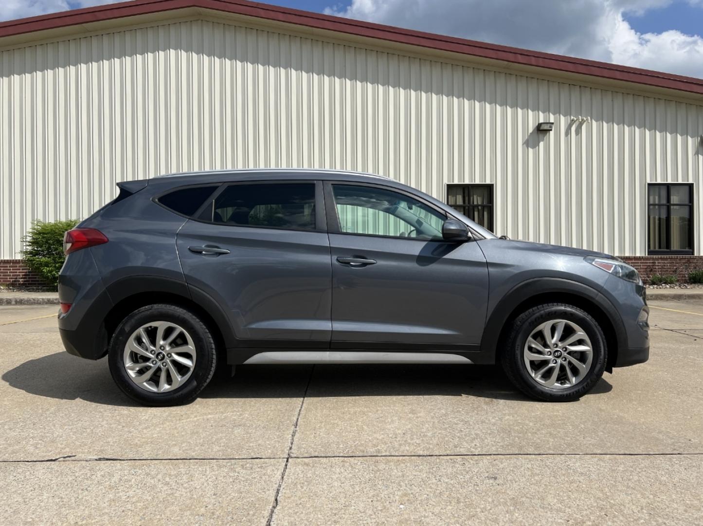 2018 GRAY /Gray Cloth Hyundai Tucson SE AWD (KM8J3CA46JU) with an 2.0L 4 Cyl. engine, Automatic transmission, located at 2990 Old Orchard Rd., Jackson, MO, 63755, 37.354214, -89.612106 - 2018 Hyundai Tucson SEL 124xxx miles All Wheel Drive 2.0L 4 Cyl. Automatic Backup Camera Power Driver Seat Heated Seats Bluetooth Cruise Power Windows/Locks/Mirrors We have financing available and we accept trades! Fill out a credit application on our website or come by today! If you hav - Photo#7