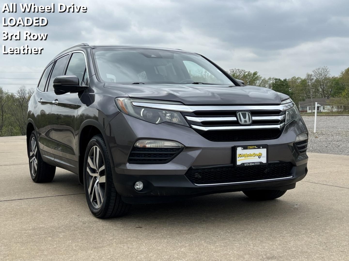 2017 GRAY /Black Leather Honda Pilot Touring 4WD (5FNYF6H92HB) with an 3.5L V6 engine, Automatic transmission, located at 2990 Old Orchard Rd., Jackson, MO, 63755, 37.354214, -89.612106 - 2017 Honda Pilot Touring 157xxx miles All Wheel Drive 3.5L V6 Automatic Leather 3rd Row Power/Heated Seats Rear Entertainment Backup Camera Sunroof Bluetooth Remote Start Cruise Power Windows/Locks/Mirrors We have financing available and we accept trades! Fill out a credit application - Photo#0