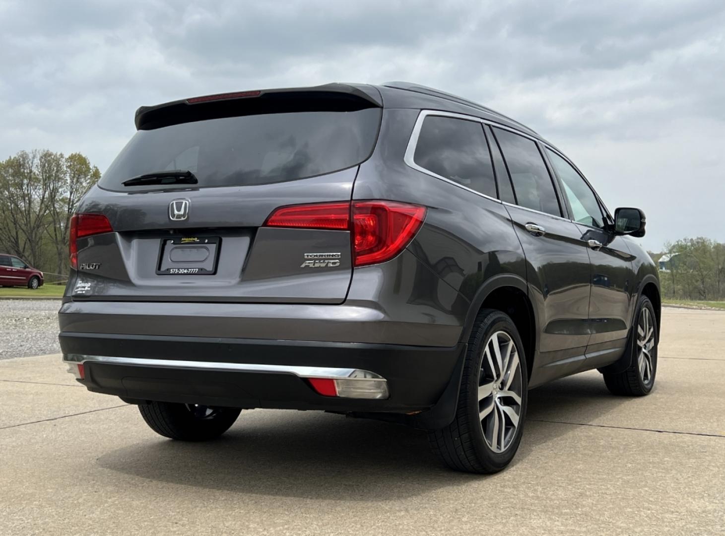 2017 GRAY /Black Leather Honda Pilot Touring 4WD (5FNYF6H92HB) with an 3.5L V6 engine, Automatic transmission, located at 2990 Old Orchard Rd., Jackson, MO, 63755, 37.354214, -89.612106 - 2017 Honda Pilot Touring 157xxx miles All Wheel Drive 3.5L V6 Automatic Leather 3rd Row Power/Heated Seats Rear Entertainment Backup Camera Sunroof Bluetooth Remote Start Cruise Power Windows/Locks/Mirrors We have financing available and we accept trades! Fill out a credit application - Photo#11
