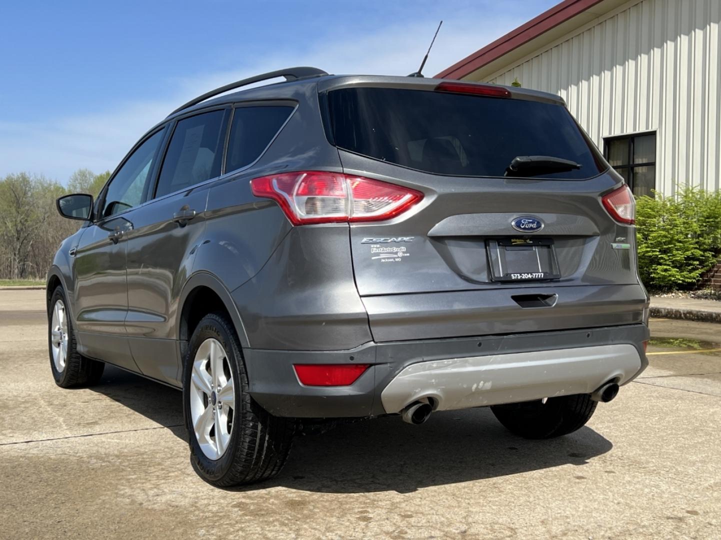 2014 GRAY /Black Leather Ford Escape SE FWD (1FMCU0GX1EU) with an 1.6L 4 Cyl. engine, Automatic transmission, located at 2990 Old Orchard Rd., Jackson, MO, 63755, 37.354214, -89.612106 - 2014 Ford Escape SE Only 90xxx miles Front Wheel Drive 1.6L 4 Cyl. Automatic Leather Power Driver Seat Heated Seats Backup Camera Bluetooth Cruise Power Windows/Locks/Mirrors We have financing available and we accept trades! Fill out a credit application on our website or come by today! - Photo#10
