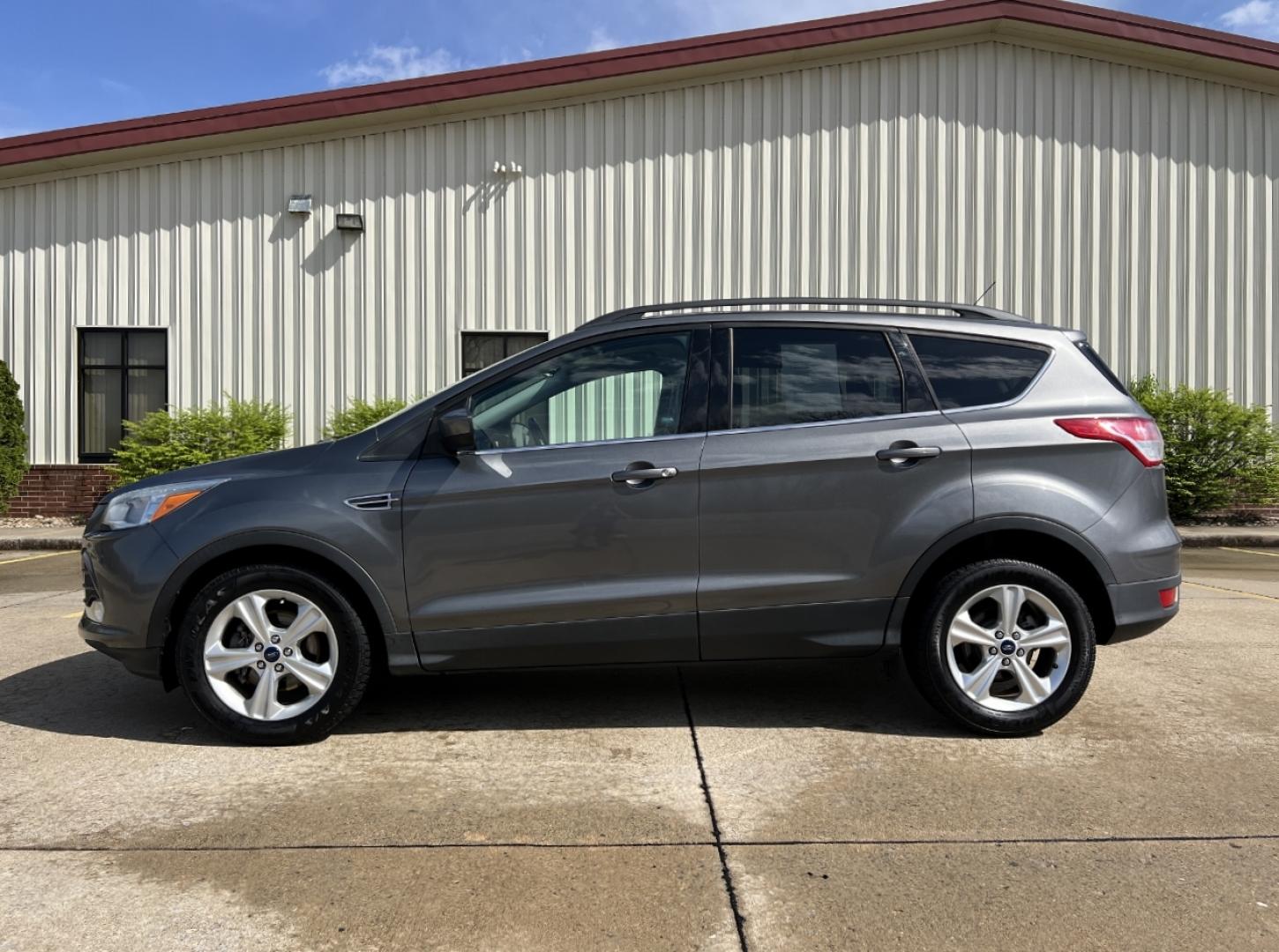 2014 GRAY /Black Leather Ford Escape SE FWD (1FMCU0GX1EU) with an 1.6L 4 Cyl. engine, Automatic transmission, located at 2990 Old Orchard Rd., Jackson, MO, 63755, 37.354214, -89.612106 - 2014 Ford Escape SE Only 90xxx miles Front Wheel Drive 1.6L 4 Cyl. Automatic Leather Power Driver Seat Heated Seats Backup Camera Bluetooth Cruise Power Windows/Locks/Mirrors We have financing available and we accept trades! Fill out a credit application on our website or come by today! - Photo#7