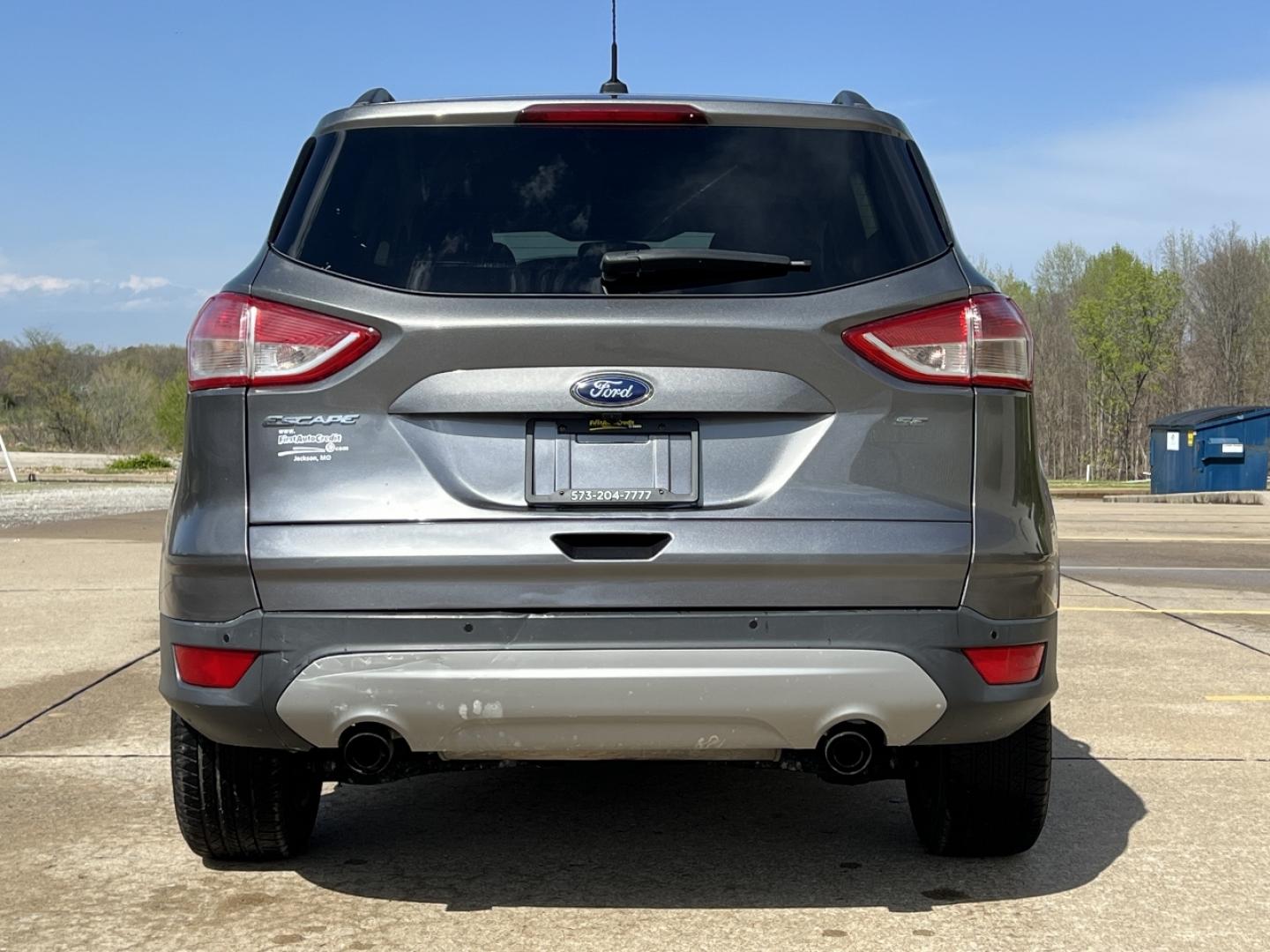 2014 GRAY /Black Leather Ford Escape SE FWD (1FMCU0GX1EU) with an 1.6L 4 Cyl. engine, Automatic transmission, located at 2990 Old Orchard Rd., Jackson, MO, 63755, 37.354214, -89.612106 - 2014 Ford Escape SE Only 90xxx miles Front Wheel Drive 1.6L 4 Cyl. Automatic Leather Power Driver Seat Heated Seats Backup Camera Bluetooth Cruise Power Windows/Locks/Mirrors We have financing available and we accept trades! Fill out a credit application on our website or come by today! - Photo#11