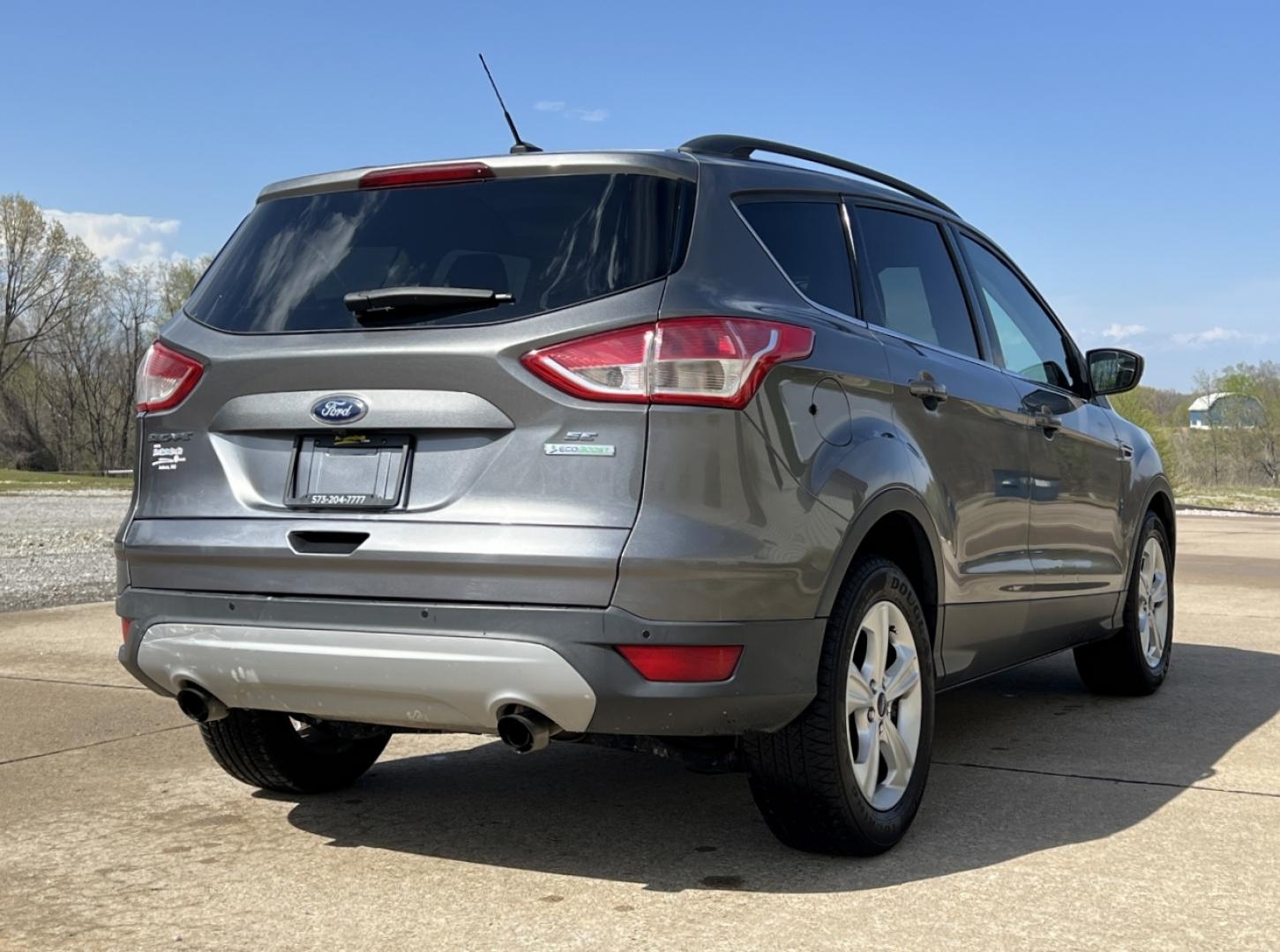 2014 GRAY /Black Leather Ford Escape SE FWD (1FMCU0GX1EU) with an 1.6L 4 Cyl. engine, Automatic transmission, located at 2990 Old Orchard Rd., Jackson, MO, 63755, 37.354214, -89.612106 - 2014 Ford Escape SE Only 90xxx miles Front Wheel Drive 1.6L 4 Cyl. Automatic Leather Power Driver Seat Heated Seats Backup Camera Bluetooth Cruise Power Windows/Locks/Mirrors We have financing available and we accept trades! Fill out a credit application on our website or come by today! - Photo#9