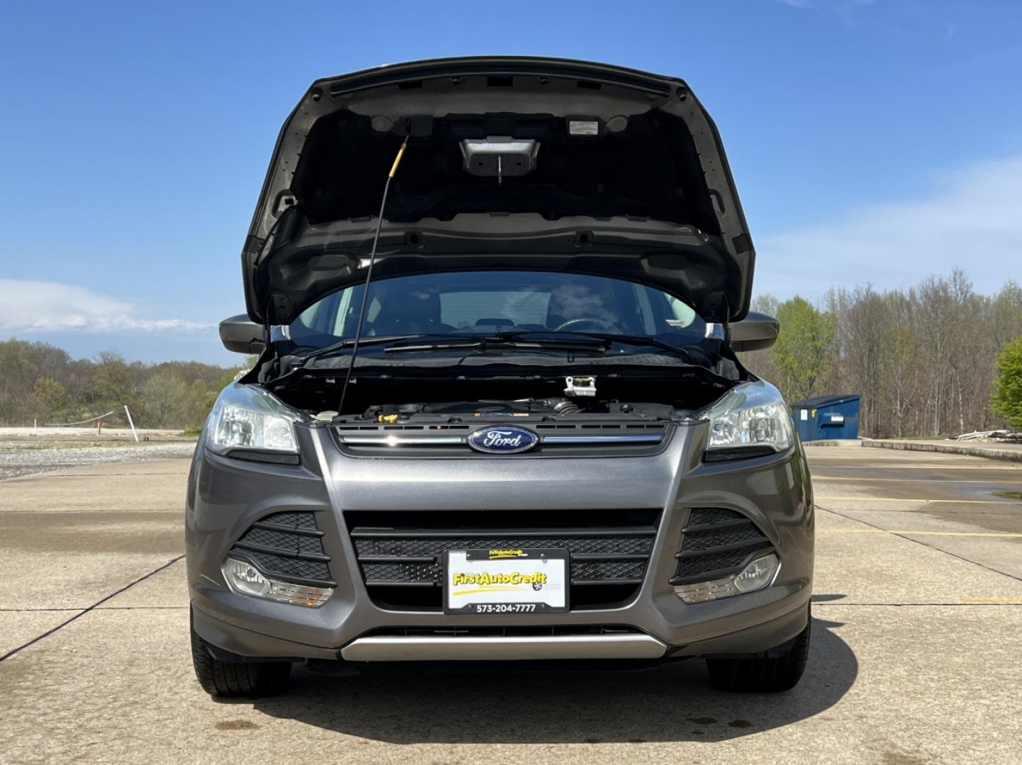 2014 GRAY /Black Leather Ford Escape SE FWD (1FMCU0GX1EU) with an 1.6L 4 Cyl. engine, Automatic transmission, located at 2990 Old Orchard Rd., Jackson, MO, 63755, 37.354214, -89.612106 - 2014 Ford Escape SE Only 90xxx miles Front Wheel Drive 1.6L 4 Cyl. Automatic Leather Power Driver Seat Heated Seats Backup Camera Bluetooth Cruise Power Windows/Locks/Mirrors We have financing available and we accept trades! Fill out a credit application on our website or come by today! - Photo#30