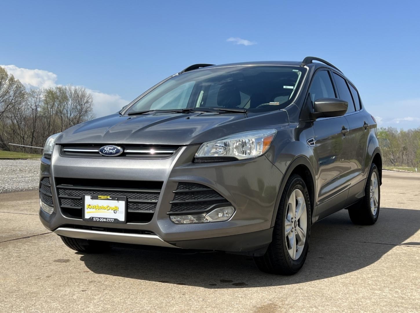 2014 GRAY /Black Leather Ford Escape SE FWD (1FMCU0GX1EU) with an 1.6L 4 Cyl. engine, Automatic transmission, located at 2990 Old Orchard Rd., Jackson, MO, 63755, 37.354214, -89.612106 - 2014 Ford Escape SE Only 90xxx miles Front Wheel Drive 1.6L 4 Cyl. Automatic Leather Power Driver Seat Heated Seats Backup Camera Bluetooth Cruise Power Windows/Locks/Mirrors We have financing available and we accept trades! Fill out a credit application on our website or come by today! - Photo#6