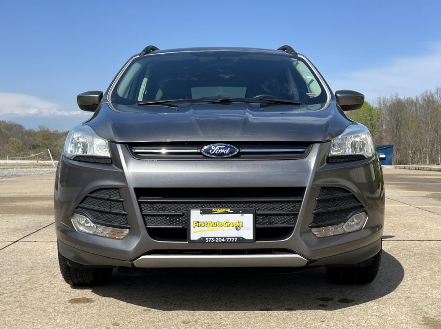 2014 GRAY /Black Leather Ford Escape SE FWD (1FMCU0GX1EU) with an 1.6L 4 Cyl. engine, Automatic transmission, located at 2990 Old Orchard Rd., Jackson, MO, 63755, 37.354214, -89.612106 - 2014 Ford Escape SE Only 90xxx miles Front Wheel Drive 1.6L 4 Cyl. Automatic Leather Power Driver Seat Heated Seats Backup Camera Bluetooth Cruise Power Windows/Locks/Mirrors We have financing available and we accept trades! Fill out a credit application on our website or come by today! - Photo#12