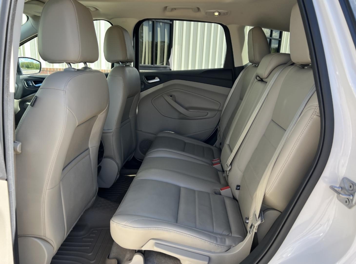 2016 WHITE /Tan Leather Ford Escape Titanium FWD (1FMCU0J9XGU) with an 2.0L 4 Cyl. engine, Automatic transmission, located at 2990 Old Orchard Rd., Jackson, MO, 63755, 37.354214, -89.612106 - 2016 Ford Escape Titanium Only 90xxx miles Front Wheel Drive 2.0L 4 Cyl. Automatic Leather Navigation Power/Heated Seats Backup Camera Sunroof Bluetooth Remote Start Cruise Power Window/Locks/Mirrors We have financing available and we accept trades! Fill out a credit application on our - Photo#19