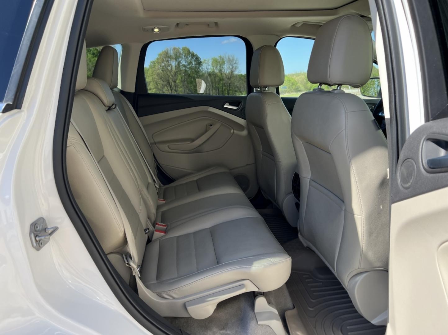 2016 WHITE /Tan Leather Ford Escape Titanium FWD (1FMCU0J9XGU) with an 2.0L 4 Cyl. engine, Automatic transmission, located at 2990 Old Orchard Rd., Jackson, MO, 63755, 37.354214, -89.612106 - 2016 Ford Escape Titanium Only 90xxx miles Front Wheel Drive 2.0L 4 Cyl. Automatic Leather Navigation Power/Heated Seats Backup Camera Sunroof Bluetooth Remote Start Cruise Power Window/Locks/Mirrors We have financing available and we accept trades! Fill out a credit application on our - Photo#20