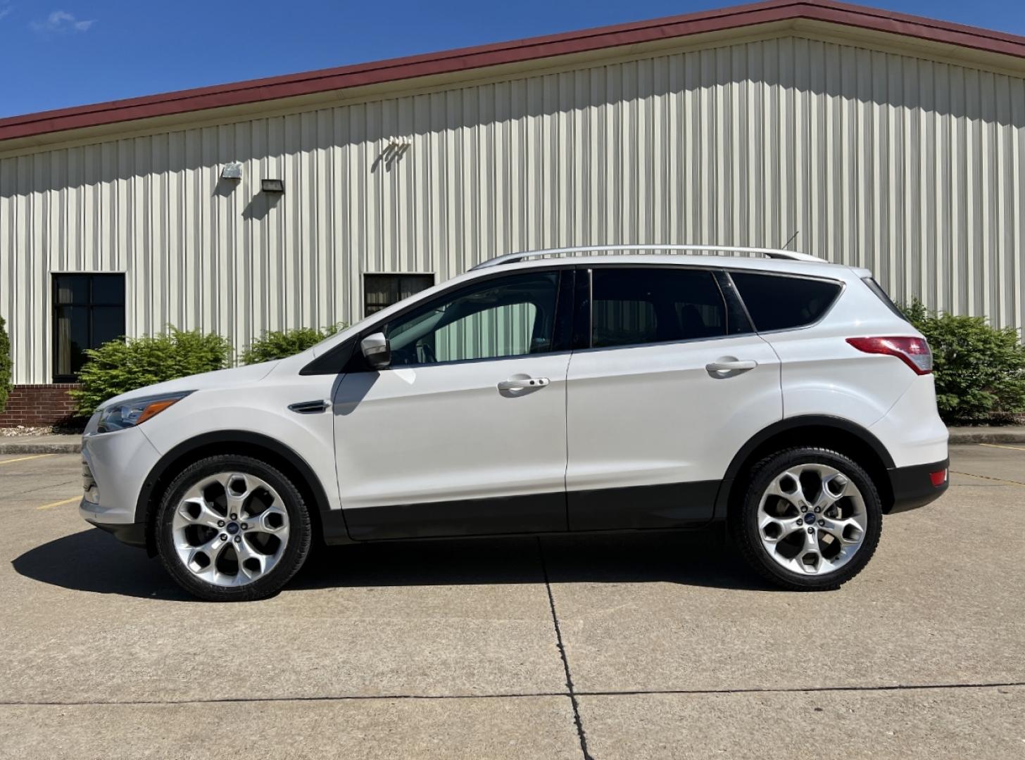 2016 WHITE /Tan Leather Ford Escape Titanium FWD (1FMCU0J9XGU) with an 2.0L 4 Cyl. engine, Automatic transmission, located at 2990 Old Orchard Rd., Jackson, MO, 63755, 37.354214, -89.612106 - 2016 Ford Escape Titanium Only 90xxx miles Front Wheel Drive 2.0L 4 Cyl. Automatic Leather Navigation Power/Heated Seats Backup Camera Sunroof Bluetooth Remote Start Cruise Power Window/Locks/Mirrors We have financing available and we accept trades! Fill out a credit application on our - Photo#9