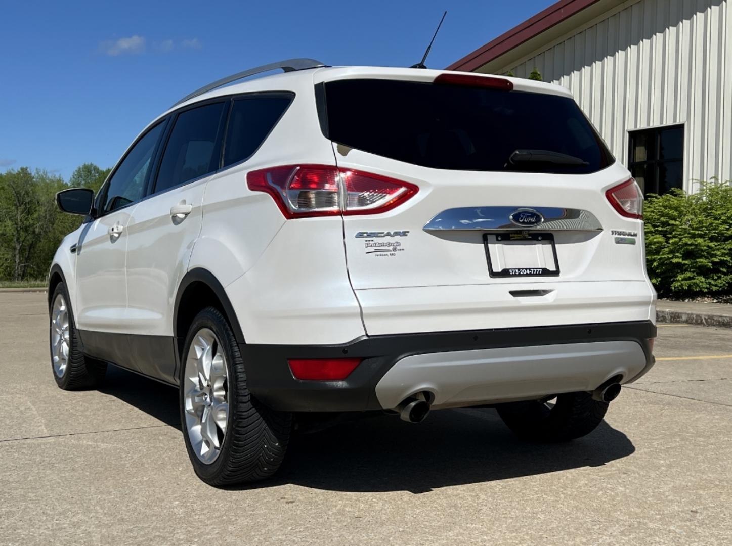 2016 WHITE /Tan Leather Ford Escape Titanium FWD (1FMCU0J9XGU) with an 2.0L 4 Cyl. engine, Automatic transmission, located at 2990 Old Orchard Rd., Jackson, MO, 63755, 37.354214, -89.612106 - 2016 Ford Escape Titanium Only 90xxx miles Front Wheel Drive 2.0L 4 Cyl. Automatic Leather Navigation Power/Heated Seats Backup Camera Sunroof Bluetooth Remote Start Cruise Power Window/Locks/Mirrors We have financing available and we accept trades! Fill out a credit application on our - Photo#12