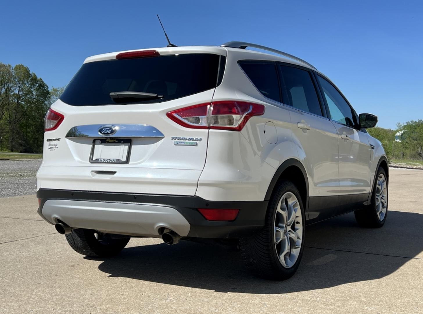 2016 WHITE /Tan Leather Ford Escape Titanium FWD (1FMCU0J9XGU) with an 2.0L 4 Cyl. engine, Automatic transmission, located at 2990 Old Orchard Rd., Jackson, MO, 63755, 37.354214, -89.612106 - 2016 Ford Escape Titanium Only 90xxx miles Front Wheel Drive 2.0L 4 Cyl. Automatic Leather Navigation Power/Heated Seats Backup Camera Sunroof Bluetooth Remote Start Cruise Power Window/Locks/Mirrors We have financing available and we accept trades! Fill out a credit application on our - Photo#11