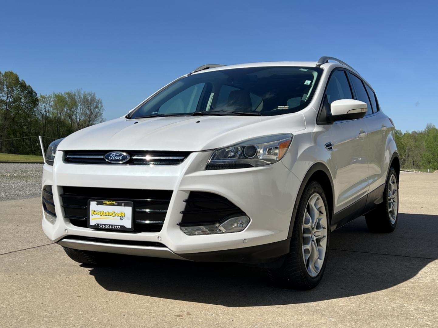 2016 WHITE /Tan Leather Ford Escape Titanium FWD (1FMCU0J9XGU) with an 2.0L 4 Cyl. engine, Automatic transmission, located at 2990 Old Orchard Rd., Jackson, MO, 63755, 37.354214, -89.612106 - 2016 Ford Escape Titanium Only 90xxx miles Front Wheel Drive 2.0L 4 Cyl. Automatic Leather Navigation Power/Heated Seats Backup Camera Sunroof Bluetooth Remote Start Cruise Power Window/Locks/Mirrors We have financing available and we accept trades! Fill out a credit application on our - Photo#8