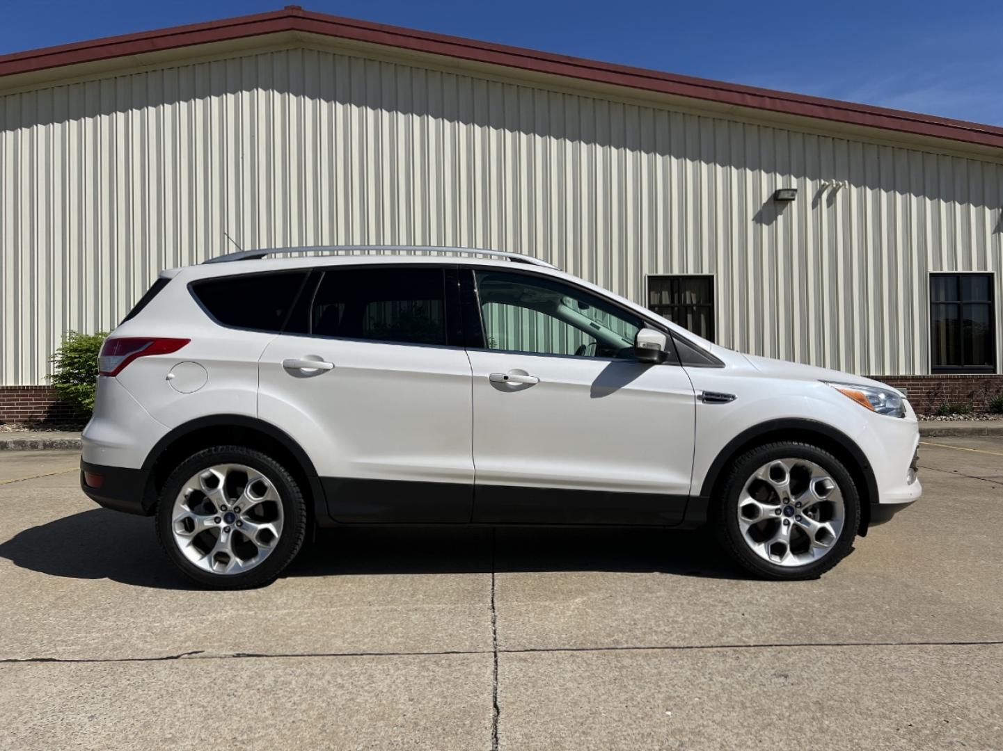 2016 WHITE /Tan Leather Ford Escape Titanium FWD (1FMCU0J9XGU) with an 2.0L 4 Cyl. engine, Automatic transmission, located at 2990 Old Orchard Rd., Jackson, MO, 63755, 37.354214, -89.612106 - 2016 Ford Escape Titanium Only 90xxx miles Front Wheel Drive 2.0L 4 Cyl. Automatic Leather Navigation Power/Heated Seats Backup Camera Sunroof Bluetooth Remote Start Cruise Power Window/Locks/Mirrors We have financing available and we accept trades! Fill out a credit application on our - Photo#10