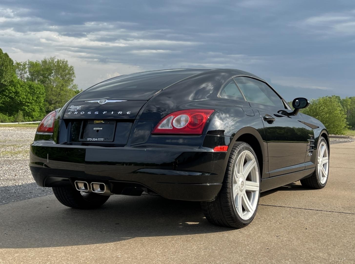 2007 Black /Black Cloth Chrysler Crossfire Coupe (1C3LN59L37X) with an 3.2L V6 engine, 6-Speed Manual transmission, located at 2990 Old Orchard Rd., Jackson, MO, 63755, 37.354214, -89.612106 - 2007 Chrysler Crossfire 156xxx miles Rear Wheel Drive 3.2L V6 6-Speed Manual Cruise Power Windows/Locks/Mirrors We have financing available and we accept trades! Fill out a credit application on our website or come by today! If you have any questions, give us a call at (573) 204-7777 or visi - Photo#5
