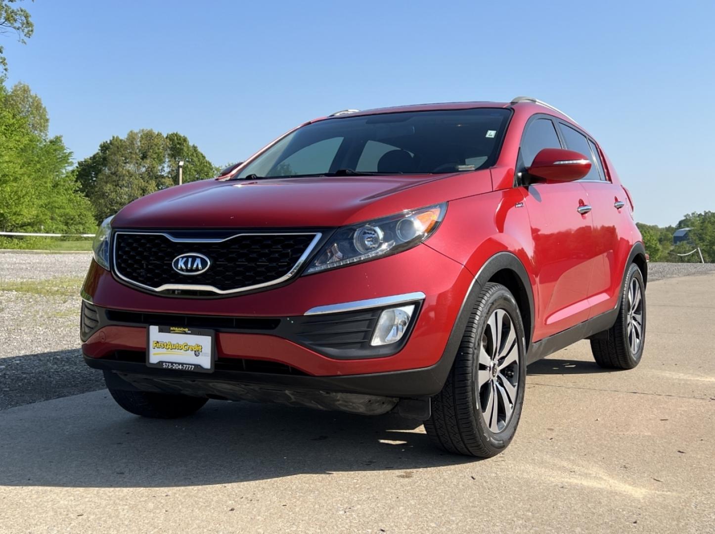 2012 RED /Gray Cloth Kia Sportage EX AWD (KNDPCCA29C7) with an 2.4L 4 Cyl. engine, Automatic transmission, located at 2990 Old Orchard Rd., Jackson, MO, 63755, 37.354214, -89.612106 - 2012 Kia Sportage EX Local 1-Owner 191xxx miles All Wheel Drive 2.4L 4 Cyl. Automatic Backup Camera Sunroof Power Driver Seat Bluetooth Cruise Power Windows/Locks/Mirrors We have financing available and we accept trades! Fill out a credit application on our website or come by today! If - Photo#5