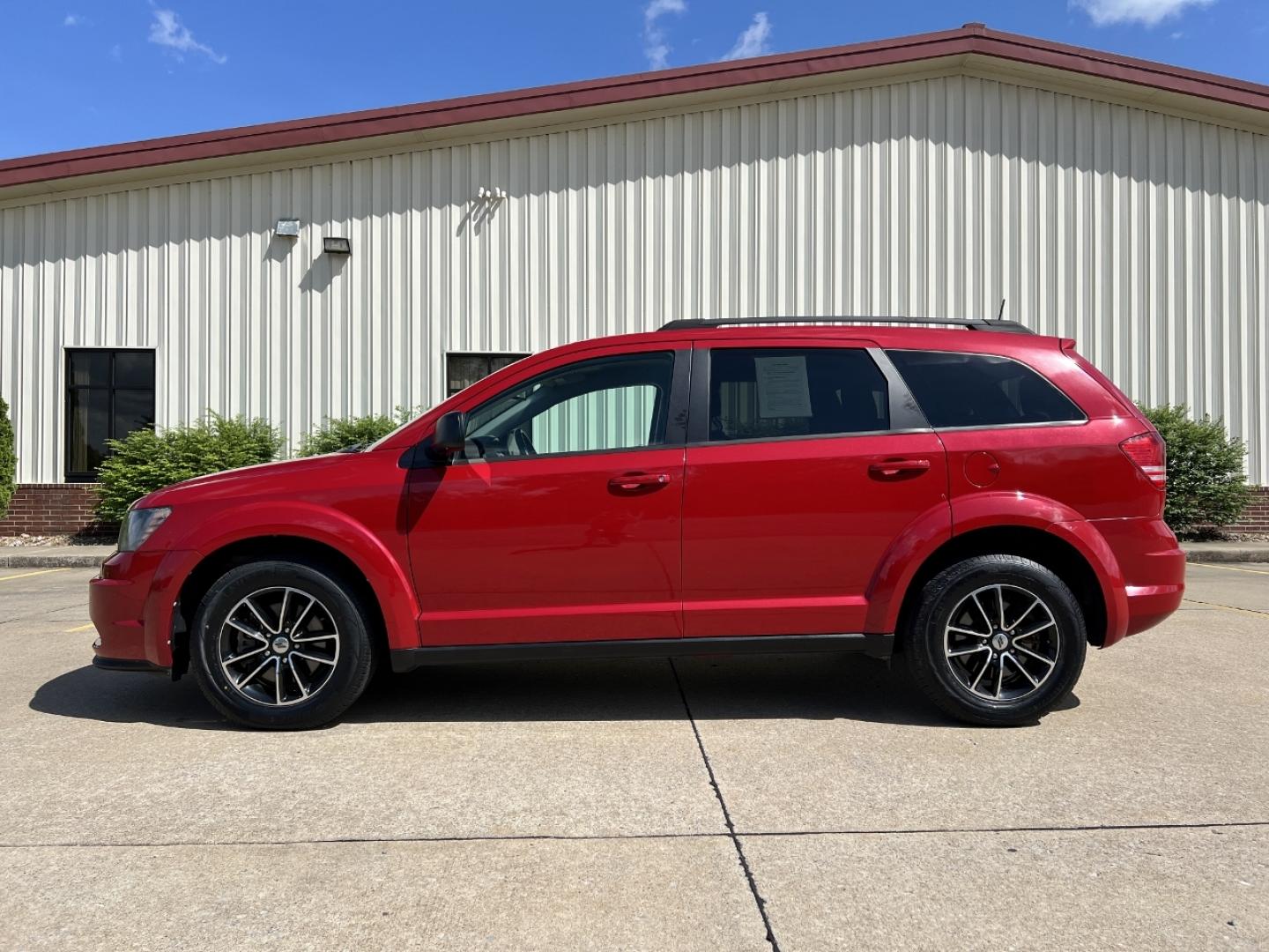 2018 RED /Black Cloth Dodge Journey SE (3C4PDCAB3JT) with an 2.4L 4 Cyl. engine, Automatic transmission, located at 2990 Old Orchard Rd., Jackson, MO, 63755, 37.354214, -89.612106 - 2018 Dodge Journey SE 88xxx miles Front Wheel Drive 2.4L 4 Cyl. Automatic 3rd Row Backup Camera Cruise Power Windows/Locks/Mirrors We have financing available and we accept trades! Fill out a credit application on our website or come by today! If you have any questions, give us a call at ( - Photo#4