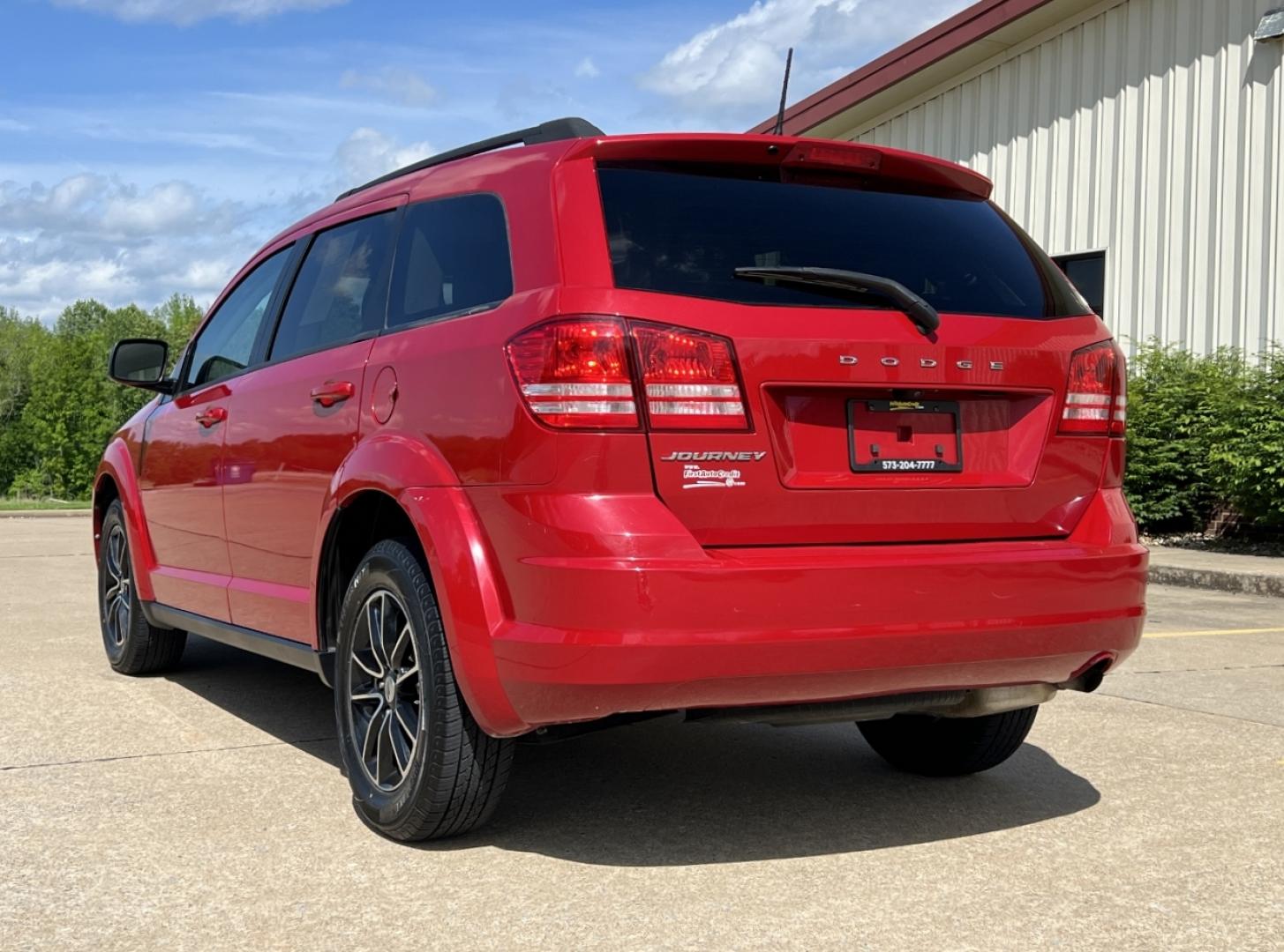 2018 RED /Black Cloth Dodge Journey SE (3C4PDCAB3JT) with an 2.4L 4 Cyl. engine, Automatic transmission, located at 2990 Old Orchard Rd., Jackson, MO, 63755, 37.354214, -89.612106 - 2018 Dodge Journey SE 88xxx miles Front Wheel Drive 2.4L 4 Cyl. Automatic 3rd Row Backup Camera Cruise Power Windows/Locks/Mirrors We have financing available and we accept trades! Fill out a credit application on our website or come by today! If you have any questions, give us a call at ( - Photo#6