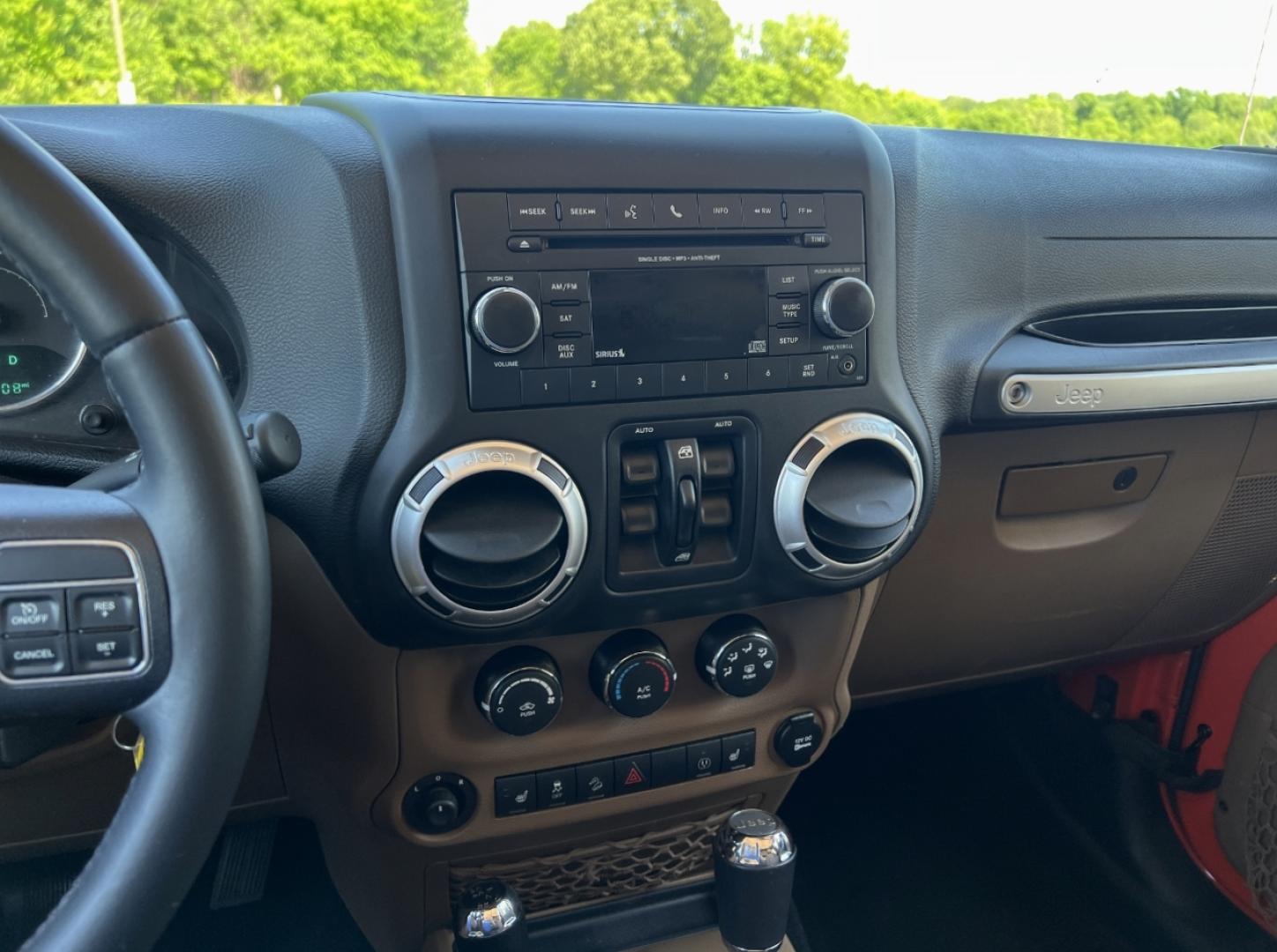 2015 ORANGE /Tan Leather Jeep Wrangler Unlimited Sahara 4WD (1C4BJWEG8FL) with an 3.6L V6 engine, Automatic transmission, located at 506 S. Kingshighway, Cape Girardeau, MO, 63703, (573) 235-5000, 37.294994, -89.556206 - 2015 Jeep Wrangler Unlimited Sahara 103xxx miles 4x4 3.6L V6 Automatic Leather Heated Seats Cruise Power Windows/Locks/Mirrors We have financing available and we accept trades! Fill out a credit application on our website or come by today! If you have any questions, give us a call at (573) - Photo#22