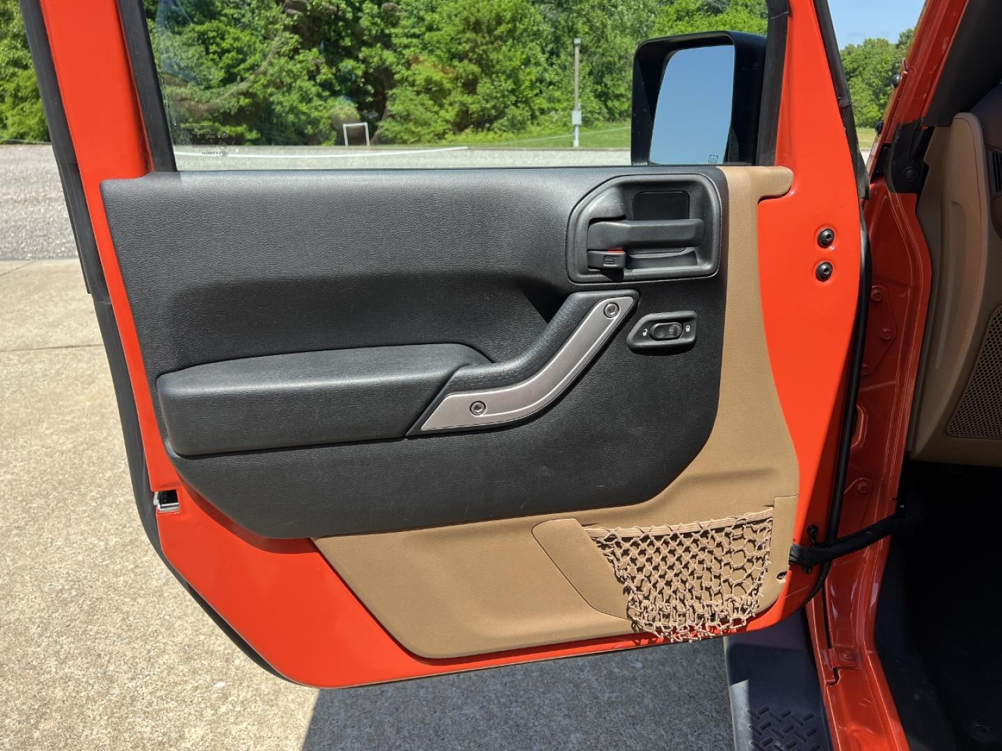 2015 ORANGE /Tan Leather Jeep Wrangler Unlimited Sahara 4WD (1C4BJWEG8FL) with an 3.6L V6 engine, Automatic transmission, located at 506 S. Kingshighway, Cape Girardeau, MO, 63703, (573) 235-5000, 37.294994, -89.556206 - 2015 Jeep Wrangler Unlimited Sahara 103xxx miles 4x4 3.6L V6 Automatic Leather Heated Seats Cruise Power Windows/Locks/Mirrors We have financing available and we accept trades! Fill out a credit application on our website or come by today! If you have any questions, give us a call at (573) - Photo#11