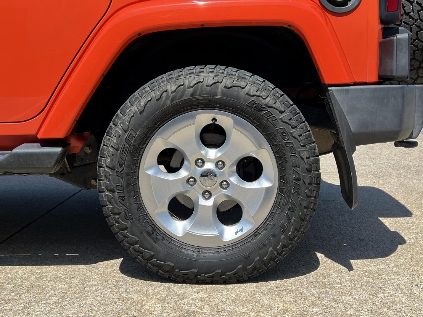 2015 ORANGE /Tan Leather Jeep Wrangler Unlimited Sahara 4WD (1C4BJWEG8FL) with an 3.6L V6 engine, Automatic transmission, located at 506 S. Kingshighway, Cape Girardeau, MO, 63703, (573) 235-5000, 37.294994, -89.556206 - 2015 Jeep Wrangler Unlimited Sahara 103xxx miles 4x4 3.6L V6 Automatic Leather Heated Seats Cruise Power Windows/Locks/Mirrors We have financing available and we accept trades! Fill out a credit application on our website or come by today! If you have any questions, give us a call at (573) - Photo#30