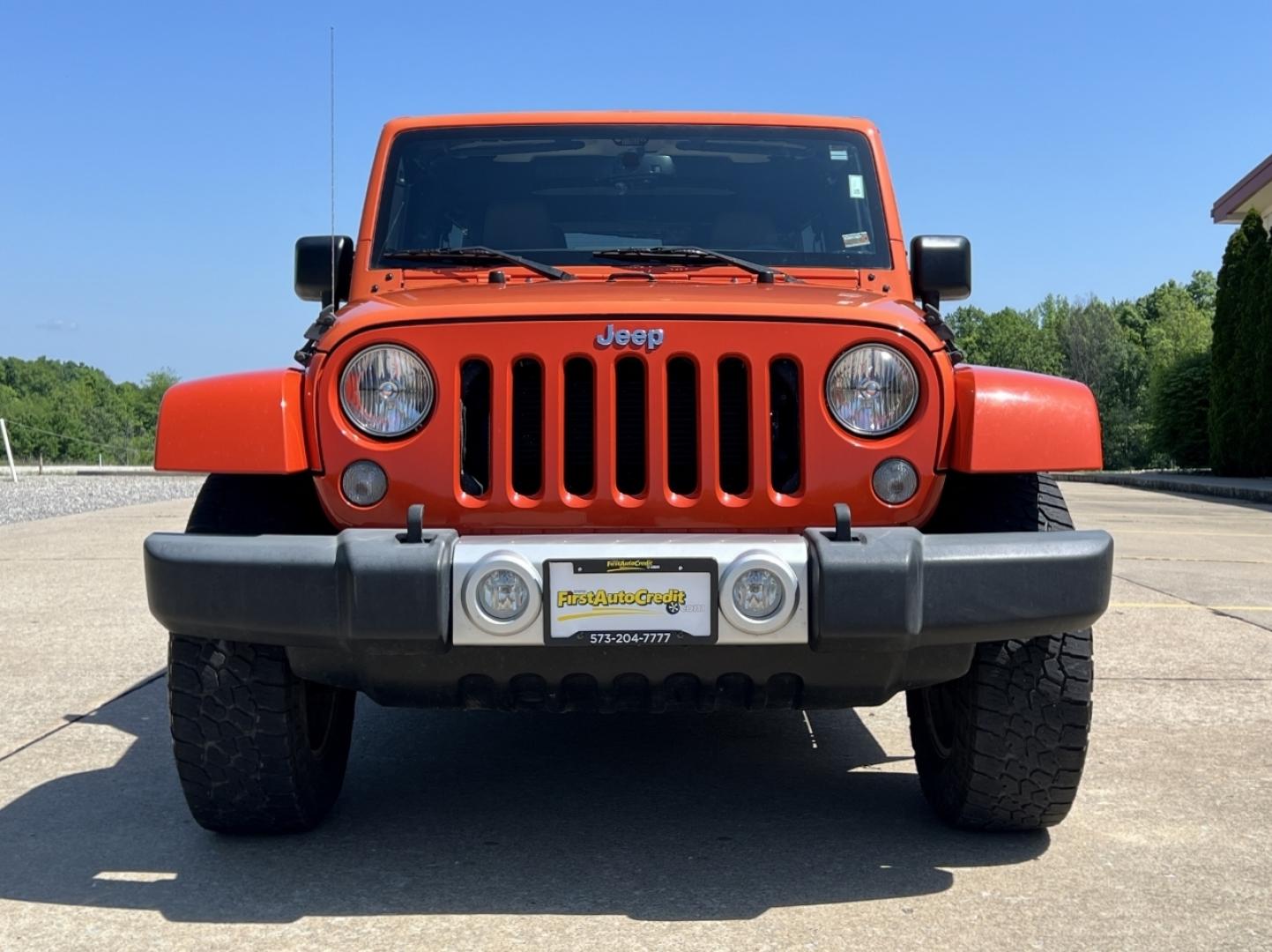 2015 ORANGE /Tan Leather Jeep Wrangler Unlimited Sahara 4WD (1C4BJWEG8FL) with an 3.6L V6 engine, Automatic transmission, located at 506 S. Kingshighway, Cape Girardeau, MO, 63703, (573) 235-5000, 37.294994, -89.556206 - 2015 Jeep Wrangler Unlimited Sahara 103xxx miles 4x4 3.6L V6 Automatic Leather Heated Seats Cruise Power Windows/Locks/Mirrors We have financing available and we accept trades! Fill out a credit application on our website or come by today! If you have any questions, give us a call at (573) - Photo#10