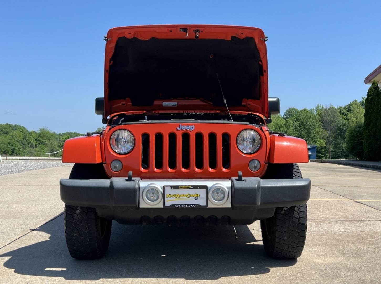 2015 ORANGE /Tan Leather Jeep Wrangler Unlimited Sahara 4WD (1C4BJWEG8FL) with an 3.6L V6 engine, Automatic transmission, located at 506 S. Kingshighway, Cape Girardeau, MO, 63703, (573) 235-5000, 37.294994, -89.556206 - 2015 Jeep Wrangler Unlimited Sahara 103xxx miles 4x4 3.6L V6 Automatic Leather Heated Seats Cruise Power Windows/Locks/Mirrors We have financing available and we accept trades! Fill out a credit application on our website or come by today! If you have any questions, give us a call at (573) - Photo#26