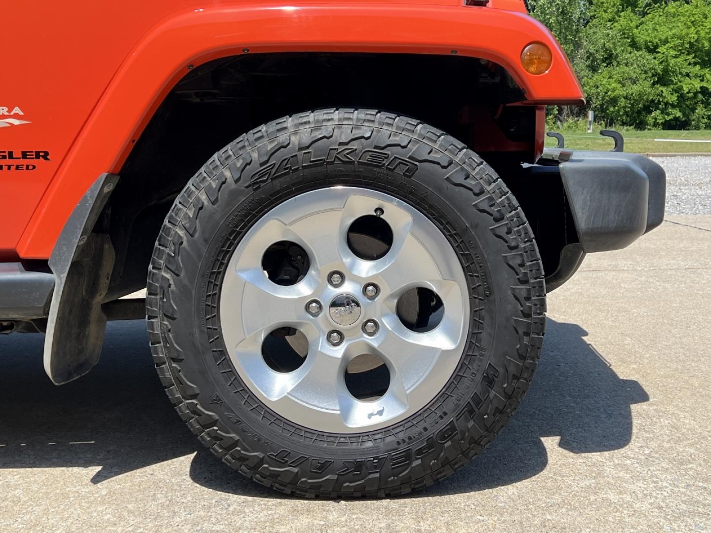 2015 ORANGE /Tan Leather Jeep Wrangler Unlimited Sahara 4WD (1C4BJWEG8FL) with an 3.6L V6 engine, Automatic transmission, located at 506 S. Kingshighway, Cape Girardeau, MO, 63703, (573) 235-5000, 37.294994, -89.556206 - 2015 Jeep Wrangler Unlimited Sahara 103xxx miles 4x4 3.6L V6 Automatic Leather Heated Seats Cruise Power Windows/Locks/Mirrors We have financing available and we accept trades! Fill out a credit application on our website or come by today! If you have any questions, give us a call at (573) - Photo#32