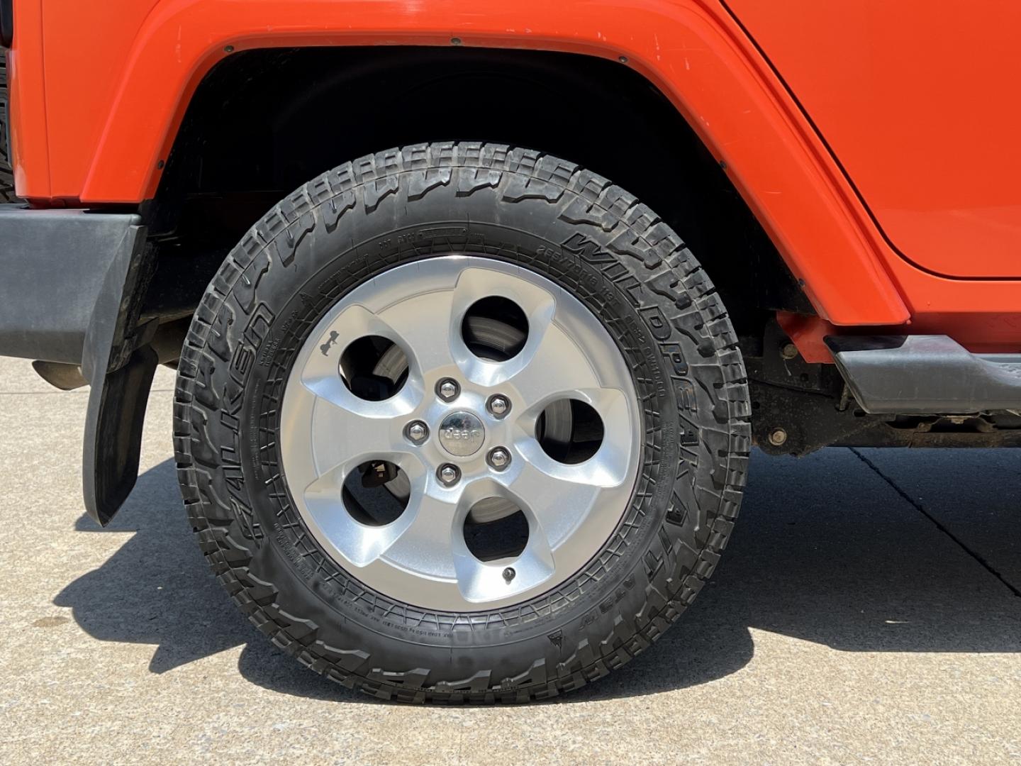 2015 ORANGE /Tan Leather Jeep Wrangler Unlimited Sahara 4WD (1C4BJWEG8FL) with an 3.6L V6 engine, Automatic transmission, located at 506 S. Kingshighway, Cape Girardeau, MO, 63703, (573) 235-5000, 37.294994, -89.556206 - 2015 Jeep Wrangler Unlimited Sahara 103xxx miles 4x4 3.6L V6 Automatic Leather Heated Seats Cruise Power Windows/Locks/Mirrors We have financing available and we accept trades! Fill out a credit application on our website or come by today! If you have any questions, give us a call at (573) - Photo#31