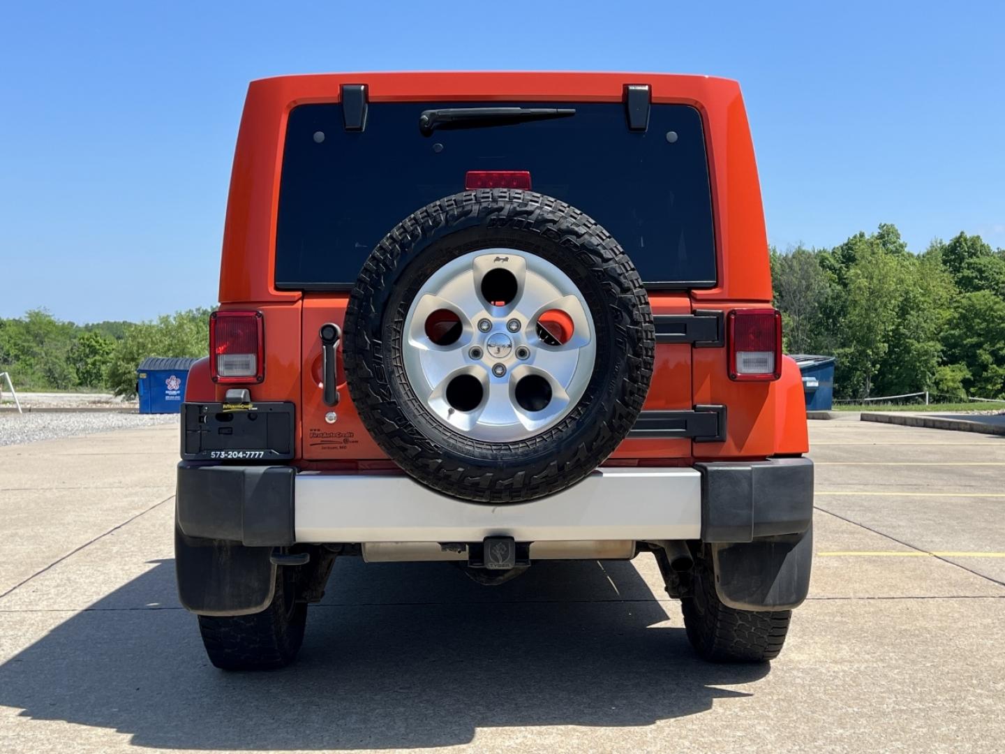 2015 ORANGE /Tan Leather Jeep Wrangler Unlimited Sahara 4WD (1C4BJWEG8FL) with an 3.6L V6 engine, Automatic transmission, located at 506 S. Kingshighway, Cape Girardeau, MO, 63703, (573) 235-5000, 37.294994, -89.556206 - 2015 Jeep Wrangler Unlimited Sahara 103xxx miles 4x4 3.6L V6 Automatic Leather Heated Seats Cruise Power Windows/Locks/Mirrors We have financing available and we accept trades! Fill out a credit application on our website or come by today! If you have any questions, give us a call at (573) - Photo#9