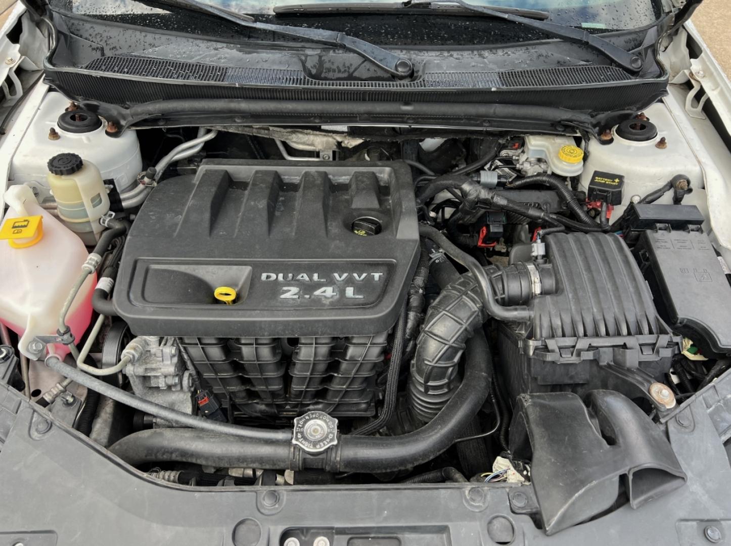 2013 WHITE /Tan Cloth Chrysler 200 Touring (1C3CCBBB2DN) with an 2.4L 4 Cyl. engine, Automatic transmission, located at 2990 Old Orchard Rd., Jackson, MO, 63755, 37.354214, -89.612106 - 2013 Chrysler 200 Touring 102xxx miles Front Wheel Drive 2.4L 4 Cyl. Automatic Power Driver Seat Heated Seats Cruise Remote Start Power Windows/Locks/Mirrors We have financing available and we accept trades! Fill out a credit application on our website or come by today! If you have any qu - Photo#30