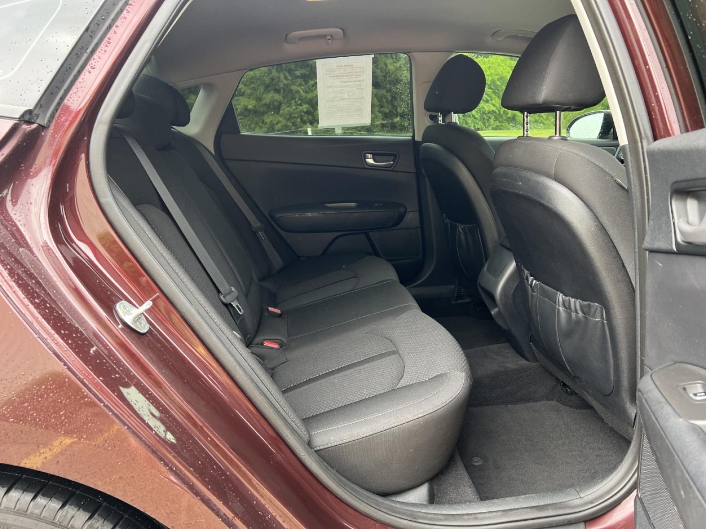 2016 MAROON /Black Cloth Kia Optima LX (5XXGT4L37GG) with an 2.4L 4 Cyl. engine, Automatic transmission, located at 506 S. Kingshighway, Cape Girardeau, MO, 63703, (573) 235-5000, 37.294994, -89.556206 - 2016 Kia Optima LX 112xxx miles Front Wheel Drive 2.4L 4 Cyl. Automatic Backup Camera Bluetooth Cruise Power Windows/Locks/Mirrors We have financing available and we accept trades! Fill out a credit application on our website or come by today! If you have any questions, give us a call at ( - Photo#15