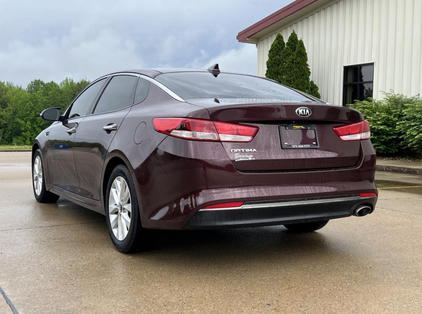 2016 MAROON /Black Cloth Kia Optima LX (5XXGT4L37GG) with an 2.4L 4 Cyl. engine, Automatic transmission, located at 506 S. Kingshighway, Cape Girardeau, MO, 63703, (573) 235-5000, 37.294994, -89.556206 - 2016 Kia Optima LX 112xxx miles Front Wheel Drive 2.4L 4 Cyl. Automatic Backup Camera Bluetooth Cruise Power Windows/Locks/Mirrors We have financing available and we accept trades! Fill out a credit application on our website or come by today! If you have any questions, give us a call at ( - Photo#7