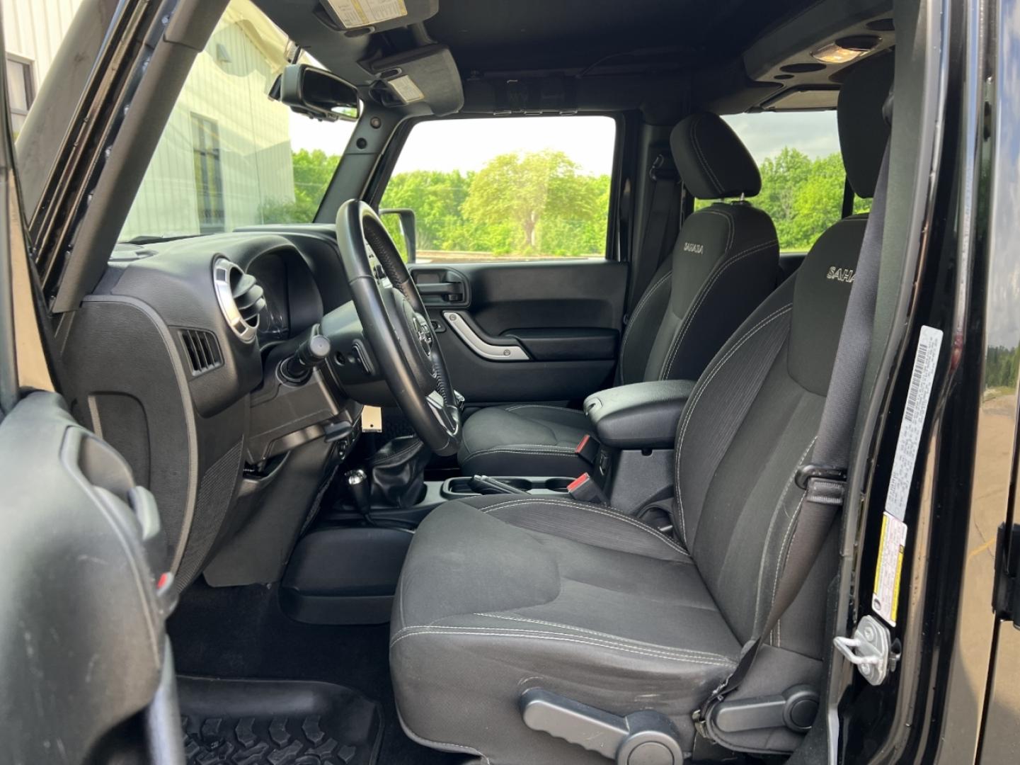 2016 BLACK /Black Cloth Jeep Wrangler Unlimited Sahara 4WD (1C4BJWEG6GL) with an 3.6L V6 engine, Manual transmission, located at 2990 Old Orchard Rd., Jackson, MO, 63755, 37.354214, -89.612106 - 2016 Jeep Wrangler Unlimited Sahara Only 90xxx miles 4x4 3.6L V6 6-Speed Manual Cruise Power Windows/Locks/Mirrors We have financing available and we accept trades! Fill out a credit application on our website or come by today! If you have any questions, give us a call at (573) 204-7777 or v - Photo#11
