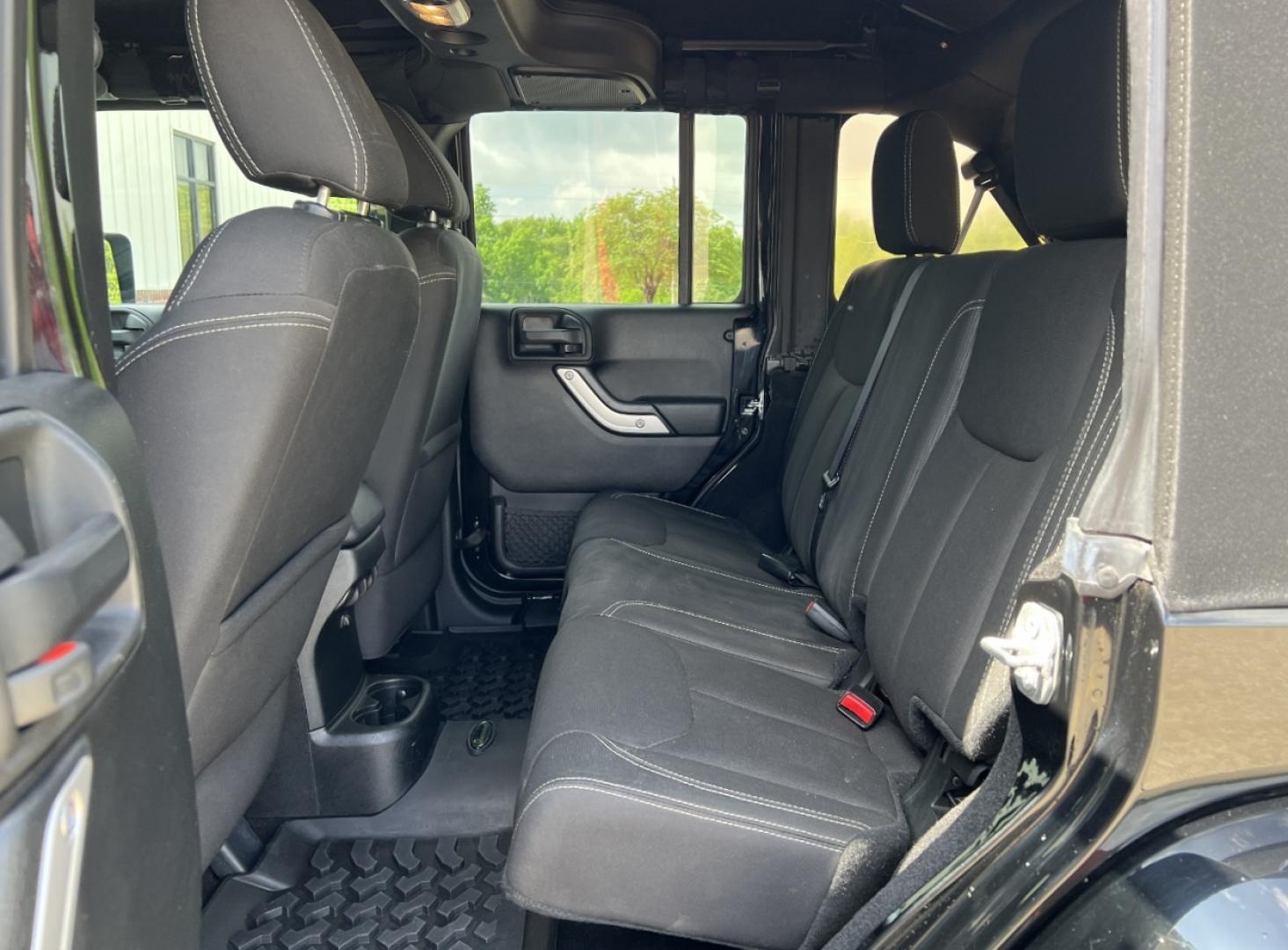 2016 BLACK /Black Cloth Jeep Wrangler Unlimited Sahara 4WD (1C4BJWEG6GL) with an 3.6L V6 engine, Manual transmission, located at 2990 Old Orchard Rd., Jackson, MO, 63755, 37.354214, -89.612106 - 2016 Jeep Wrangler Unlimited Sahara Only 90xxx miles 4x4 3.6L V6 6-Speed Manual Cruise Power Windows/Locks/Mirrors We have financing available and we accept trades! Fill out a credit application on our website or come by today! If you have any questions, give us a call at (573) 204-7777 or v - Photo#14