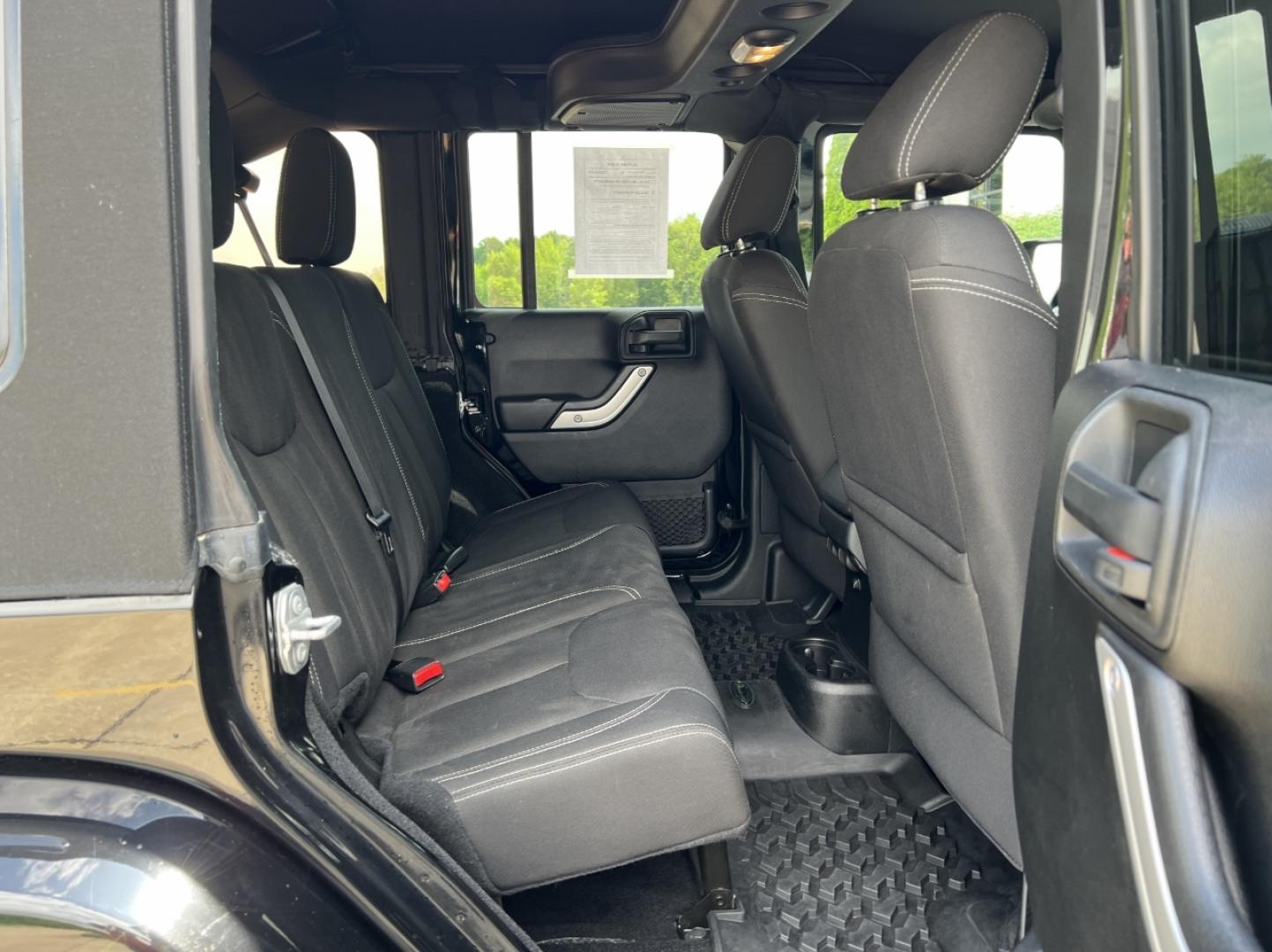 2016 BLACK /Black Cloth Jeep Wrangler Unlimited Sahara 4WD (1C4BJWEG6GL) with an 3.6L V6 engine, Manual transmission, located at 2990 Old Orchard Rd., Jackson, MO, 63755, 37.354214, -89.612106 - 2016 Jeep Wrangler Unlimited Sahara Only 90xxx miles 4x4 3.6L V6 6-Speed Manual Cruise Power Windows/Locks/Mirrors We have financing available and we accept trades! Fill out a credit application on our website or come by today! If you have any questions, give us a call at (573) 204-7777 or v - Photo#15