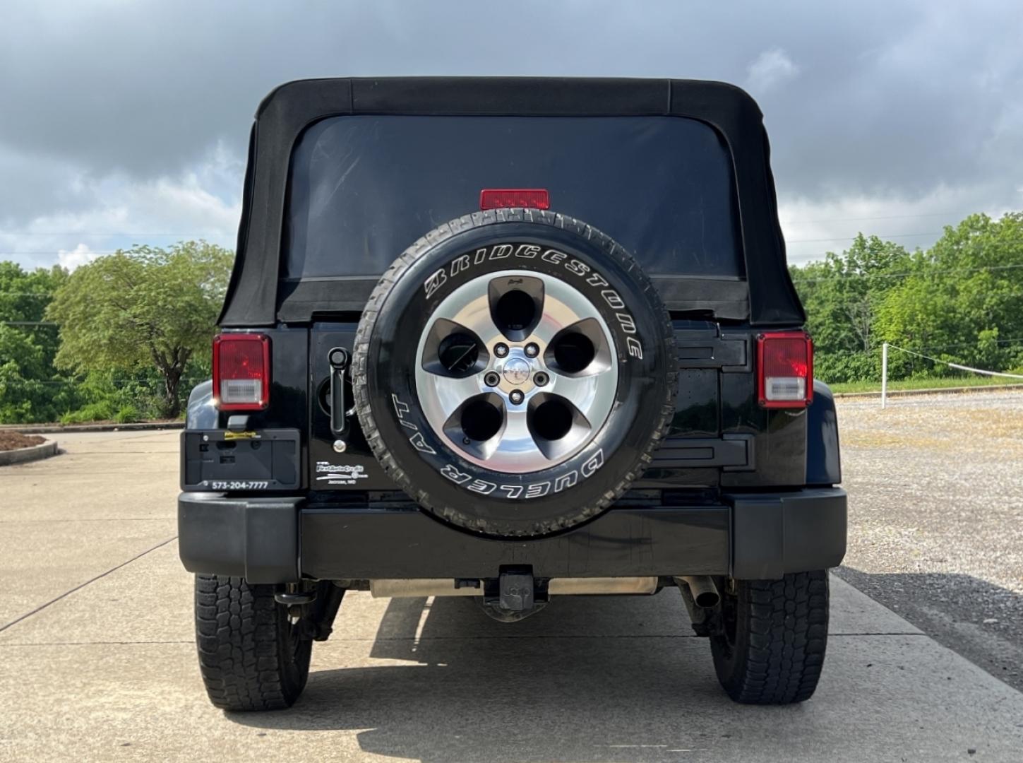 2016 BLACK /Black Cloth Jeep Wrangler Unlimited Sahara 4WD (1C4BJWEG6GL) with an 3.6L V6 engine, Manual transmission, located at 2990 Old Orchard Rd., Jackson, MO, 63755, 37.354214, -89.612106 - 2016 Jeep Wrangler Unlimited Sahara Only 90xxx miles 4x4 3.6L V6 6-Speed Manual Cruise Power Windows/Locks/Mirrors We have financing available and we accept trades! Fill out a credit application on our website or come by today! If you have any questions, give us a call at (573) 204-7777 or v - Photo#8