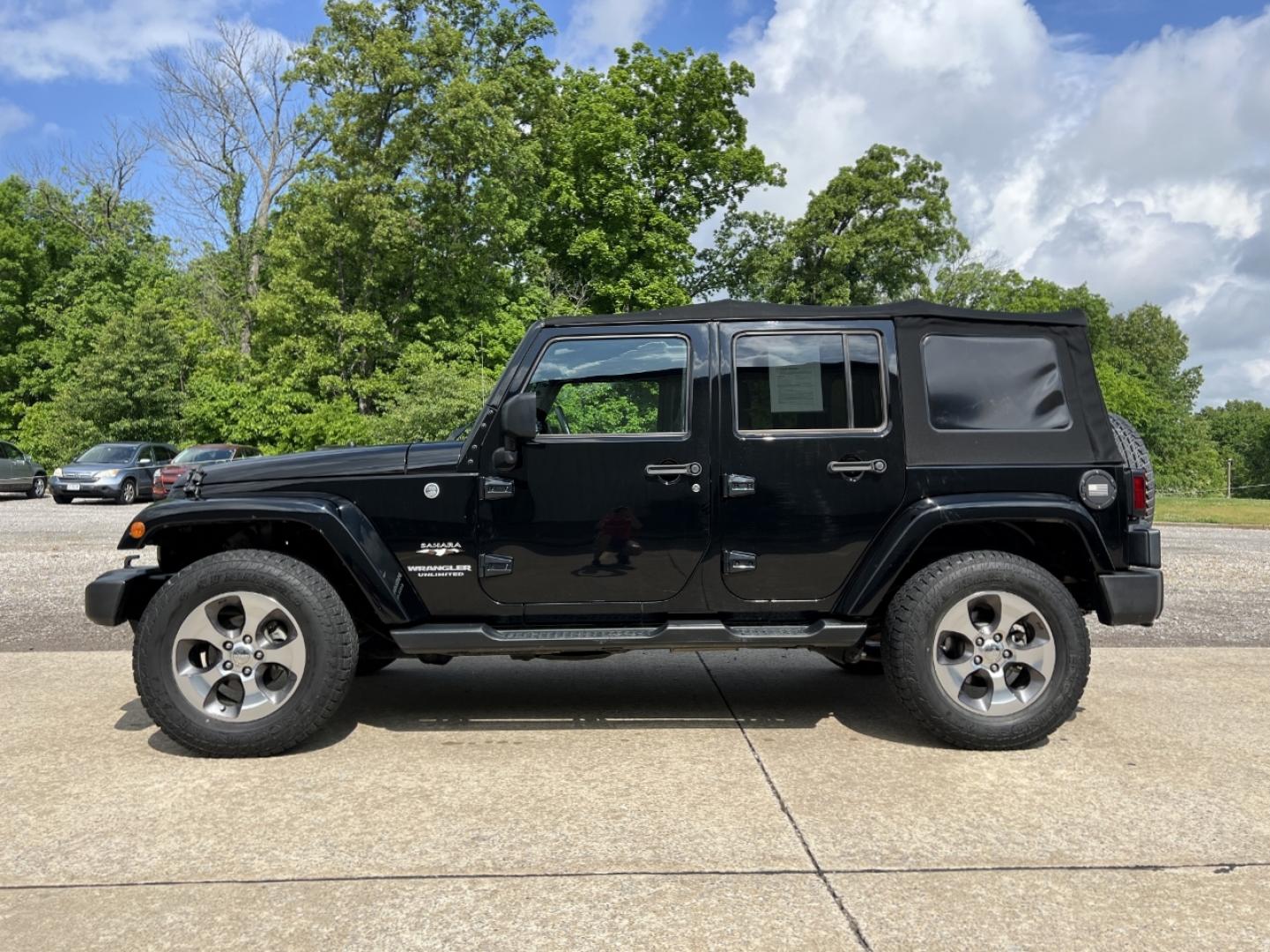2016 BLACK /Black Cloth Jeep Wrangler Unlimited Sahara 4WD (1C4BJWEG6GL) with an 3.6L V6 engine, Manual transmission, located at 2990 Old Orchard Rd., Jackson, MO, 63755, 37.354214, -89.612106 - 2016 Jeep Wrangler Unlimited Sahara Only 90xxx miles 4x4 3.6L V6 6-Speed Manual Cruise Power Windows/Locks/Mirrors We have financing available and we accept trades! Fill out a credit application on our website or come by today! If you have any questions, give us a call at (573) 204-7777 or v - Photo#4