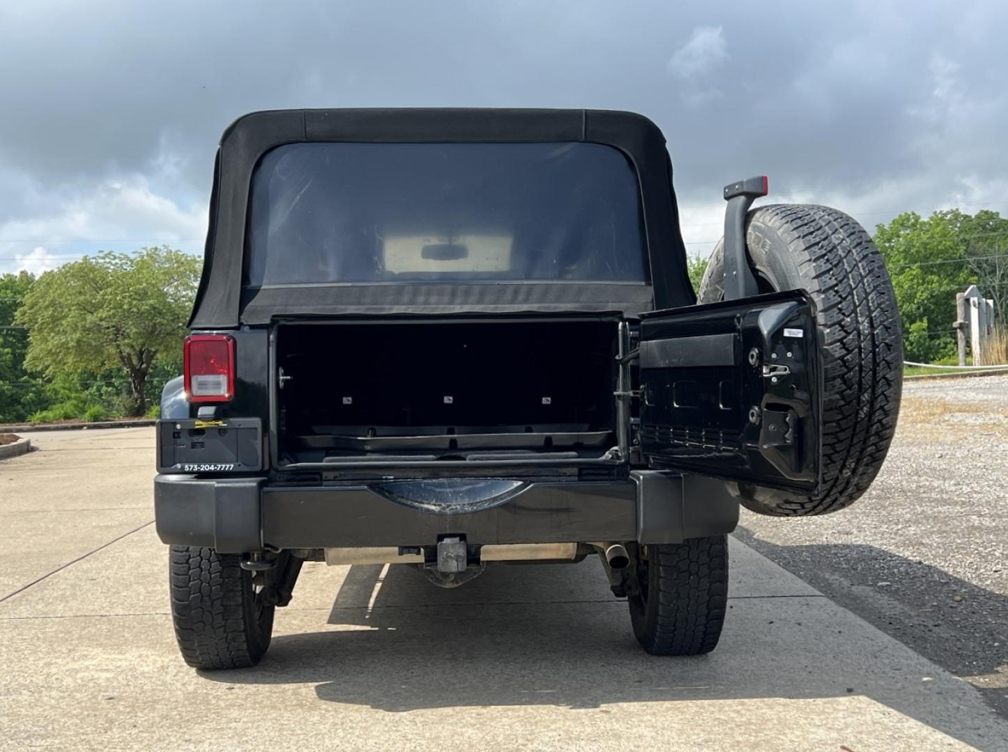 2016 BLACK /Black Cloth Jeep Wrangler Unlimited Sahara 4WD (1C4BJWEG6GL) with an 3.6L V6 engine, Manual transmission, located at 2990 Old Orchard Rd., Jackson, MO, 63755, 37.354214, -89.612106 - 2016 Jeep Wrangler Unlimited Sahara Only 90xxx miles 4x4 3.6L V6 6-Speed Manual Cruise Power Windows/Locks/Mirrors We have financing available and we accept trades! Fill out a credit application on our website or come by today! If you have any questions, give us a call at (573) 204-7777 or v - Photo#16