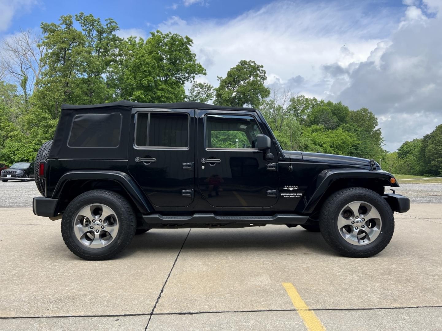 2016 BLACK /Black Cloth Jeep Wrangler Unlimited Sahara 4WD (1C4BJWEG6GL) with an 3.6L V6 engine, Manual transmission, located at 2990 Old Orchard Rd., Jackson, MO, 63755, 37.354214, -89.612106 - 2016 Jeep Wrangler Unlimited Sahara Only 90xxx miles 4x4 3.6L V6 6-Speed Manual Cruise Power Windows/Locks/Mirrors We have financing available and we accept trades! Fill out a credit application on our website or come by today! If you have any questions, give us a call at (573) 204-7777 or v - Photo#5