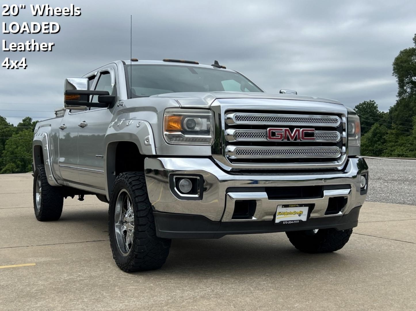 2015 SILVER /Black Leather GMC Sierra 2500HD SLT Crew Cab 4WD (1GT12ZEG4FF) with an 6.0L V8 engine, Automatic transmission, located at 2990 Old Orchard Rd., Jackson, MO, 63755, 37.354214, -89.612106 - 2015 GMC Sierra 2500HD SLT 166xxx miles 4x4 6.0L V8 Automatic Leather Navigation Power/Heated Seats Backup Camera Bluetooth Remote Start Cruise Power Windows/Locks/Mirrors We have financing available and we accept trades! Fill out a credit application on our website or come by today! I - Photo#0