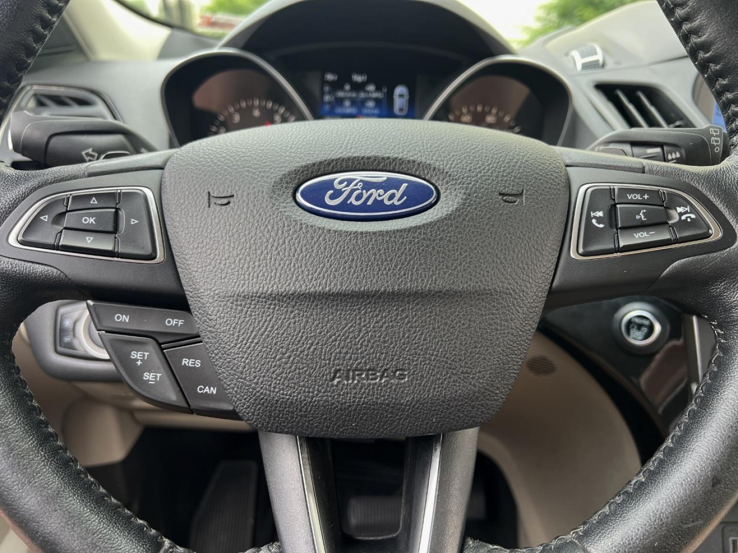2017 GOLD /Tan Leather Ford Escape Titanium FWD (1FMCU0JD2HU) with an 1.5L 4 Cyl. engine, Automatic transmission, located at 2990 Old Orchard Rd., Jackson, MO, 63755, 37.354214, -89.612106 - 2017 Ford Escape Titanium 86xxx miles Front Wheel Drive 1.5L 4 Cyl. Automatic Leather Power/Heated Seats Backup Camera Bluetooth Remote Start Cruise Power Windows/Locks/Mirrors We have financing available and we accept trades! Fill out a credit application on our website or come by today - Photo#23